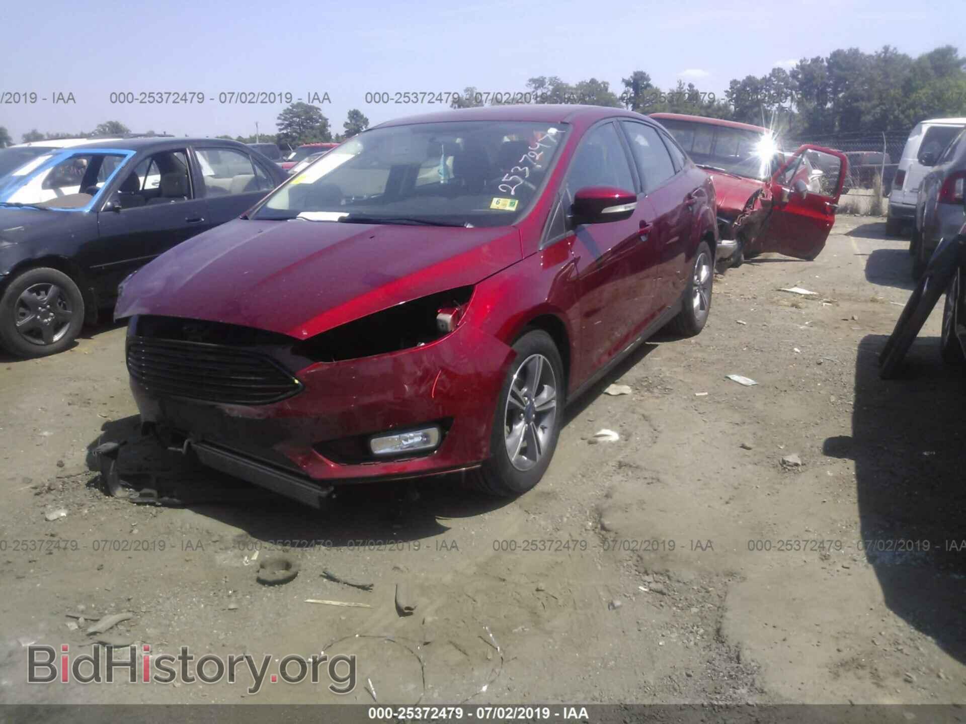 2017 FORD FOCUS - VIN: 1FADP3FE9HL306597 - Photo 2