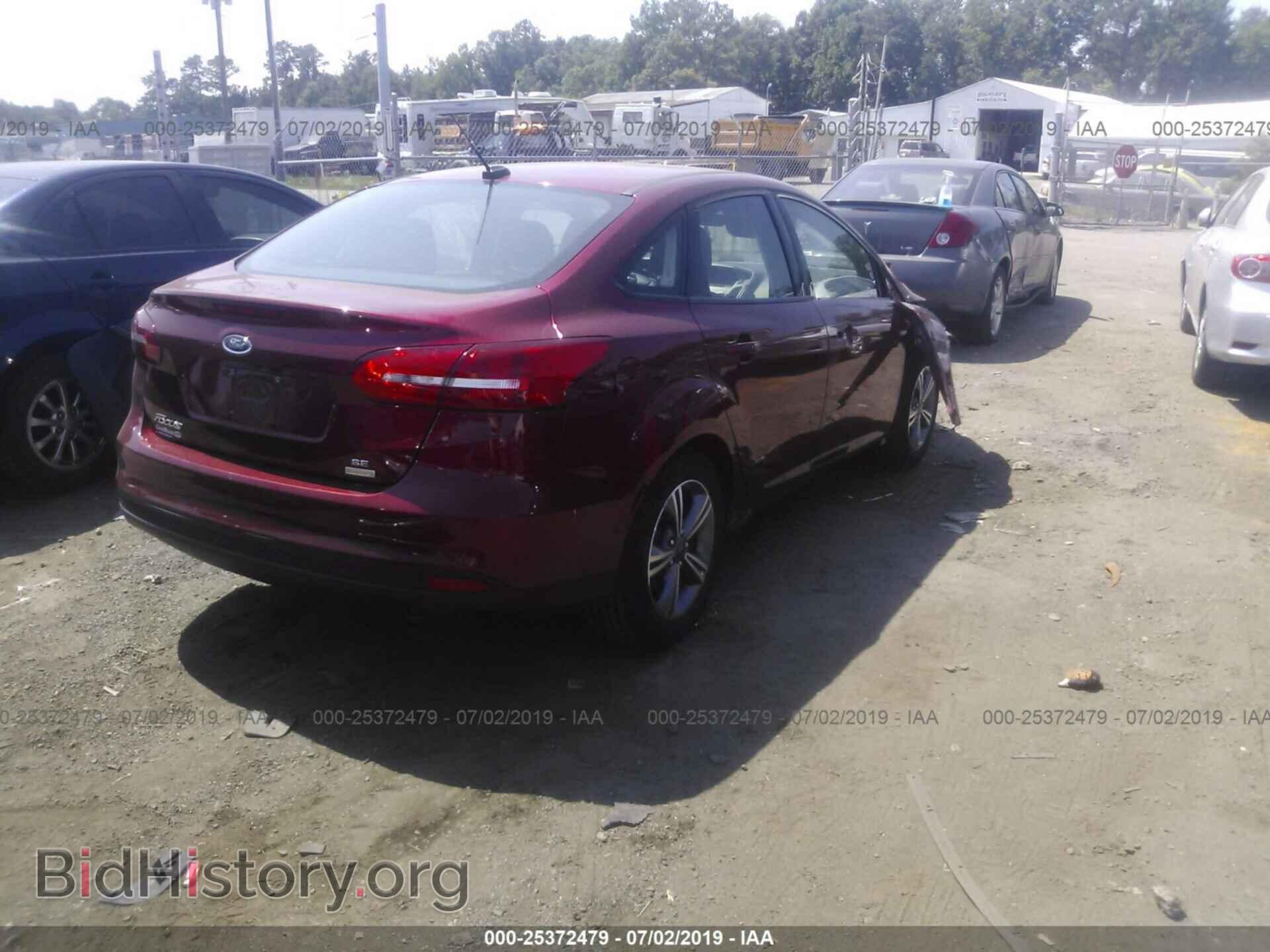 2017 FORD FOCUS - VIN: 1FADP3FE9HL306597 - Photo 4