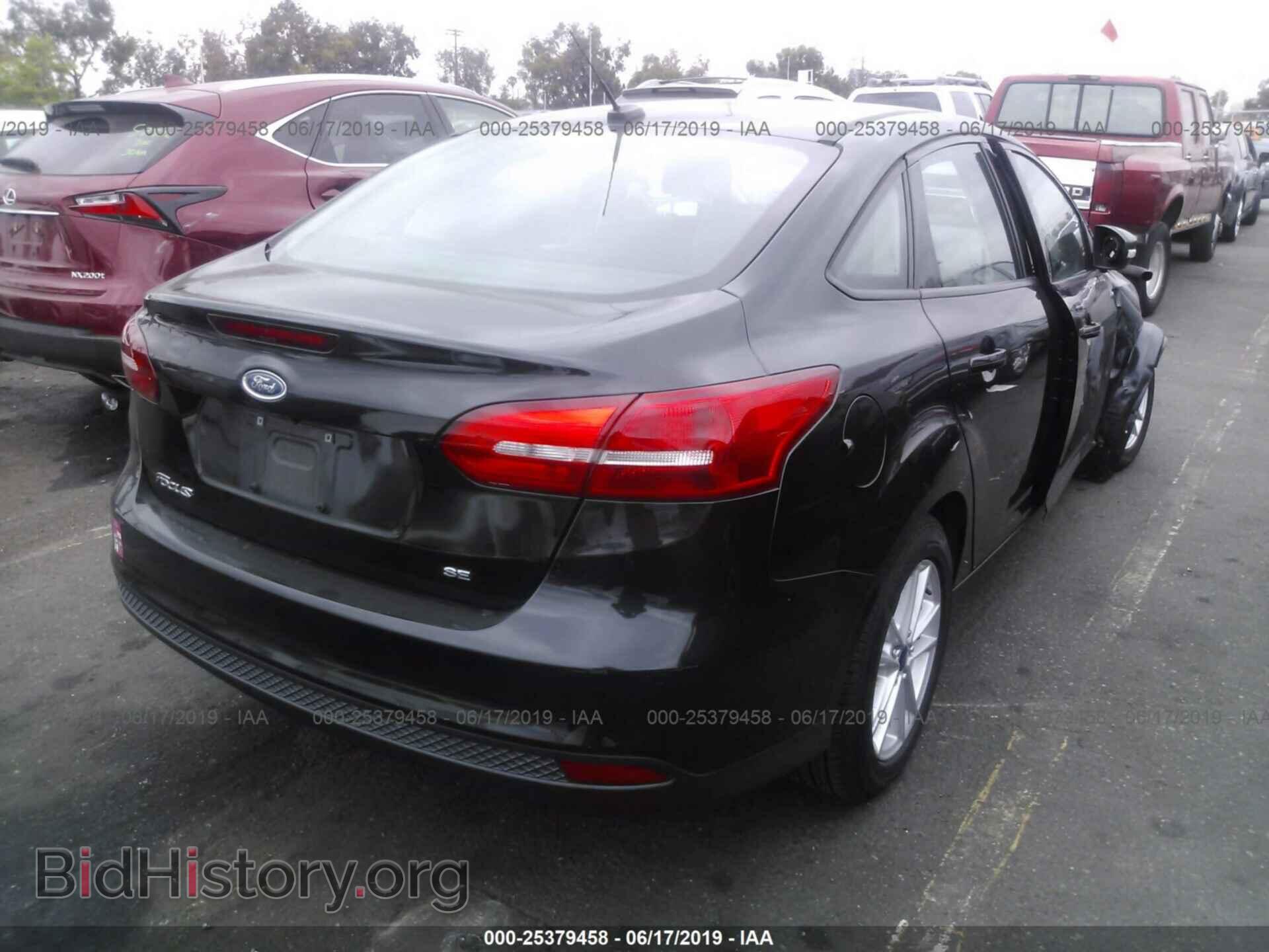 2015 FORD FOCUS - VIN: 1FADP3F21FL348877 - Photo 4