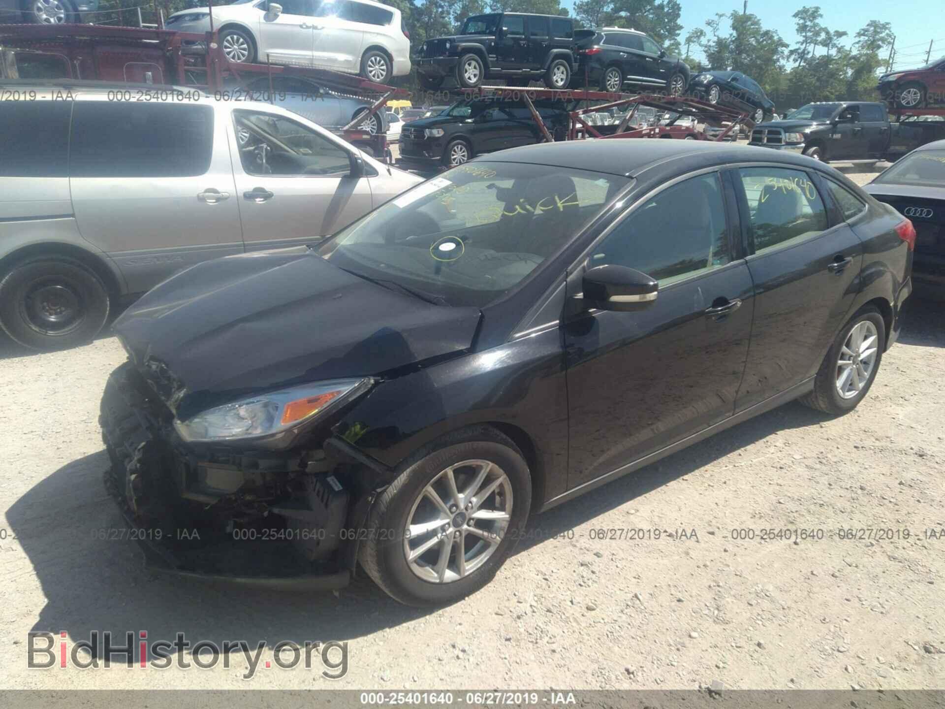 2016 FORD FOCUS - VIN: 1FADP3F25GL214360 - Фото 2