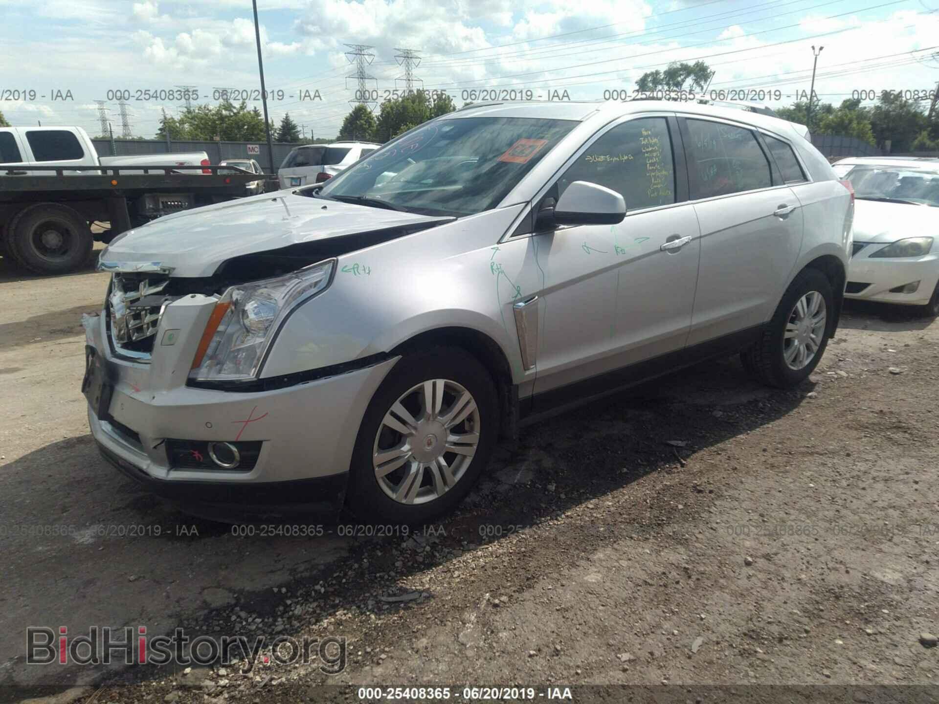 2014 CADILLAC SRX - VIN: 3GYFNCE39ES571996 - Фото 2