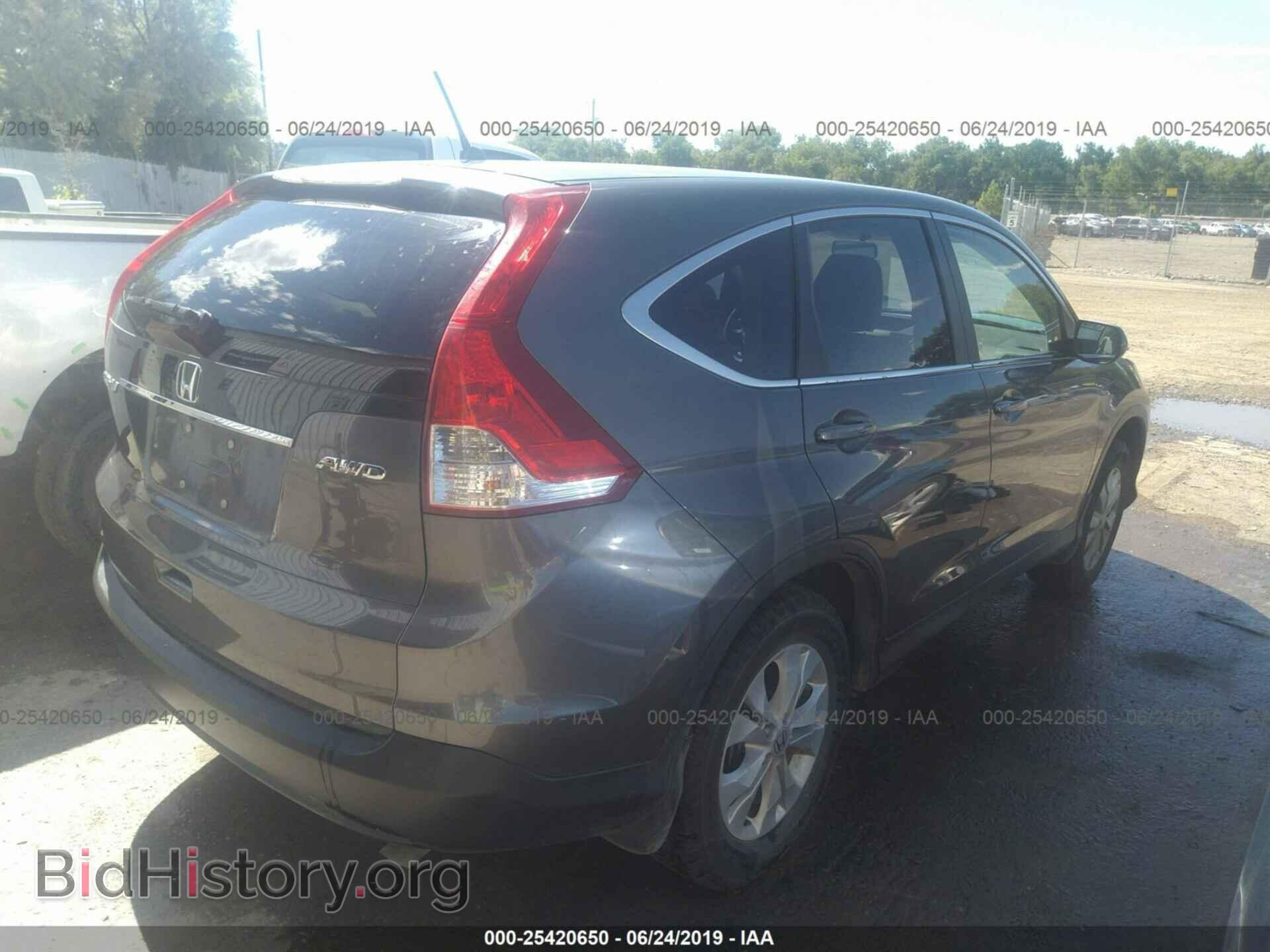 2014 HONDA CR-V - VIN: 2HKRM4H58EH687709 - Фото 4