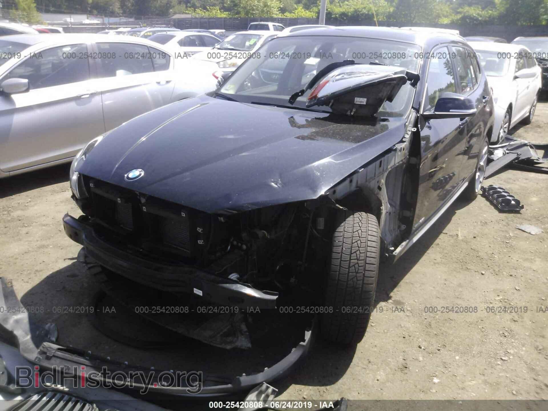2014 BMW X1 - VIN: WBAVL1C54EVY17845 - Фото 2