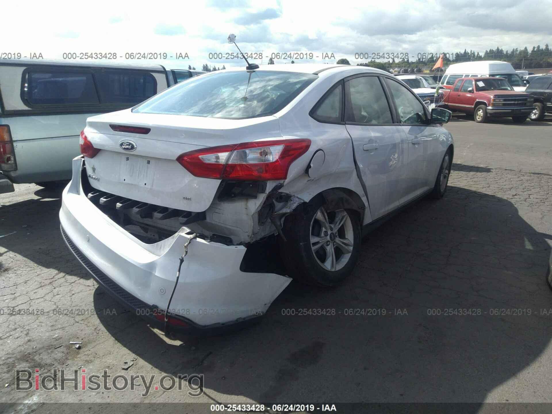2014 FORD FOCUS - VIN: 1FADP3F21EL219312 - Photo 4