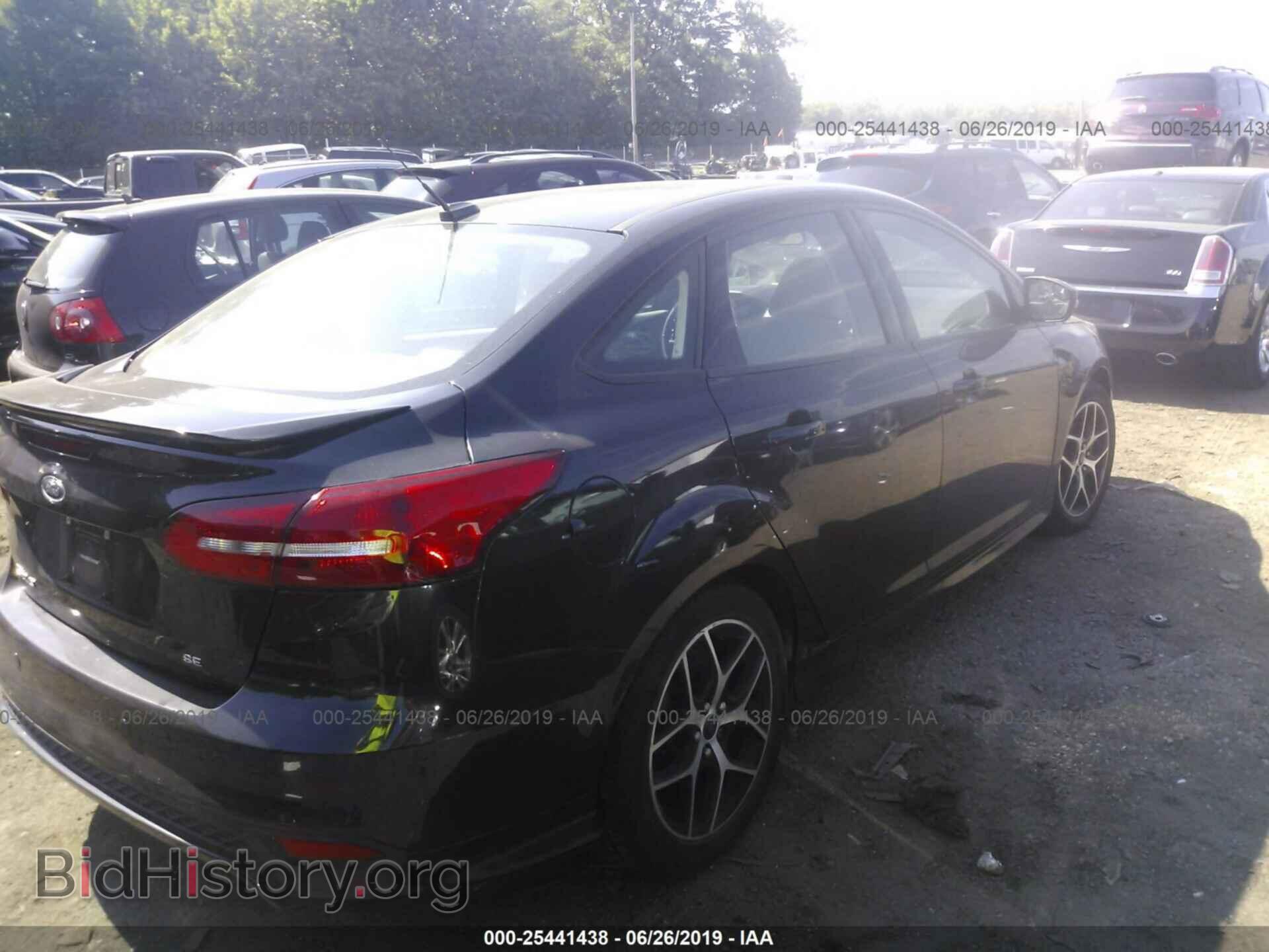 2015 FORD FOCUS - VIN: 1FADP3F22FL304807 - Photo 4