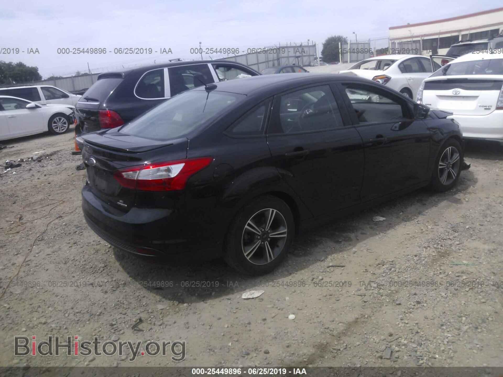 2014 FORD FOCUS - VIN: 1FADP3F20EL345015 - Photo 4