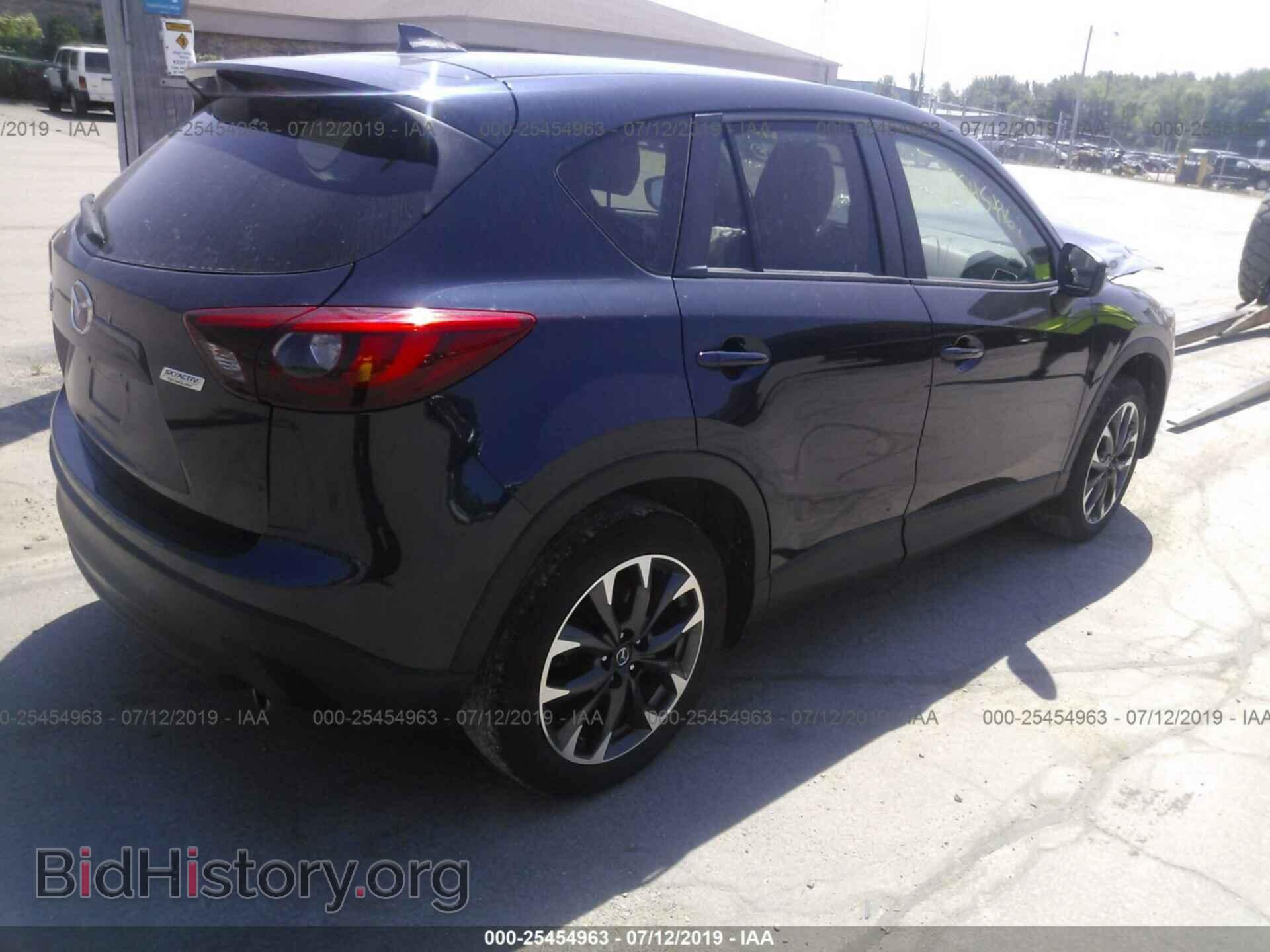 2016 MAZDA CX-5 - VIN: JM3KE4DY7G0811099 - Photo 4