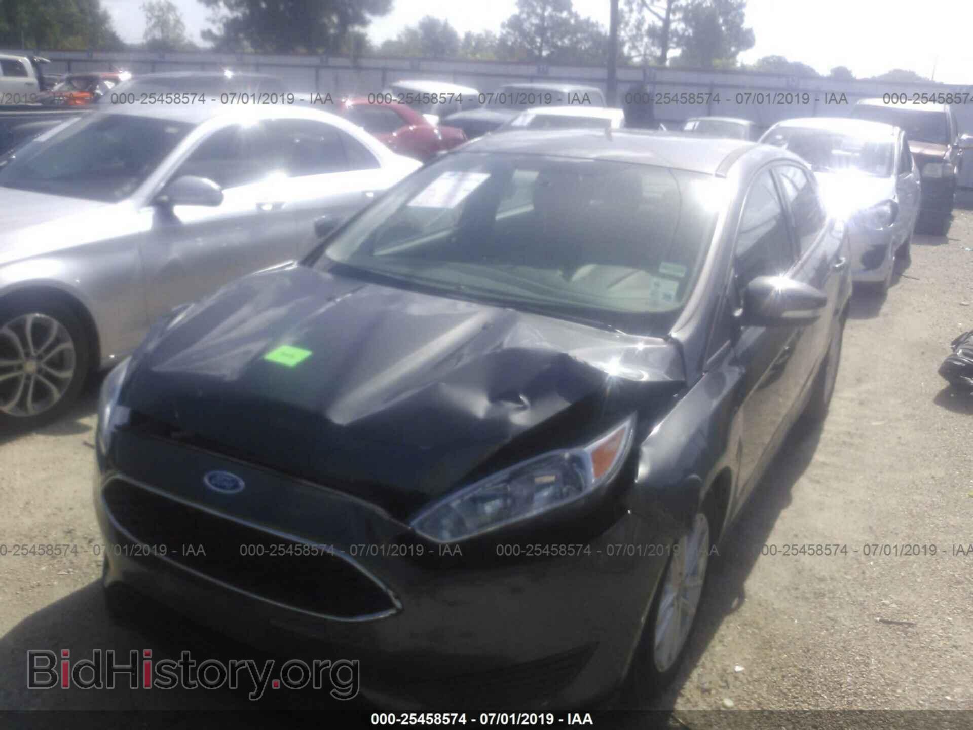 2016 FORD FOCUS - VIN: 1FADP3F21GL304556 - Photo 2
