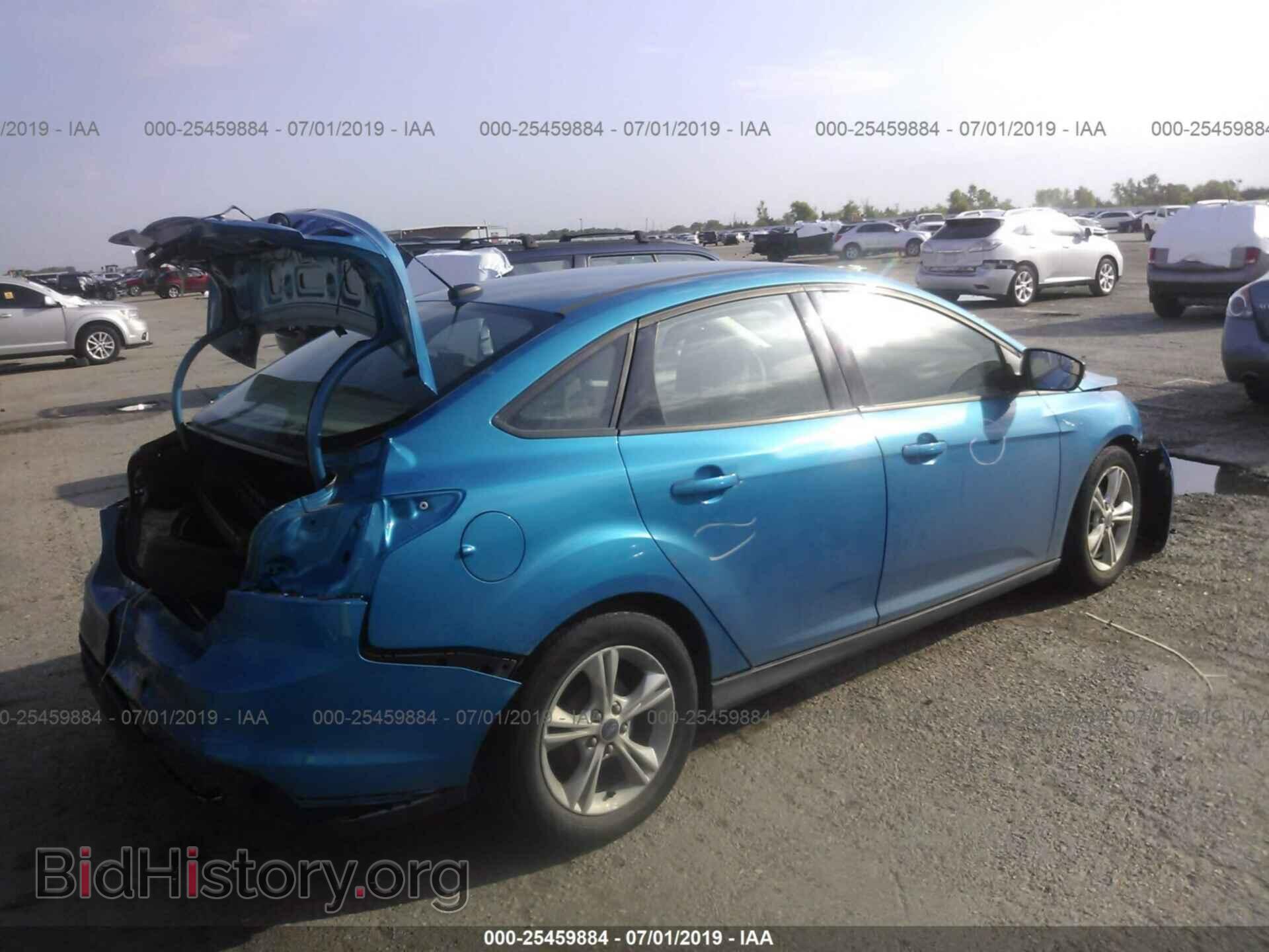 2014 FORD FOCUS - VIN: 1FADP3F2XEL460429 - Photo 4