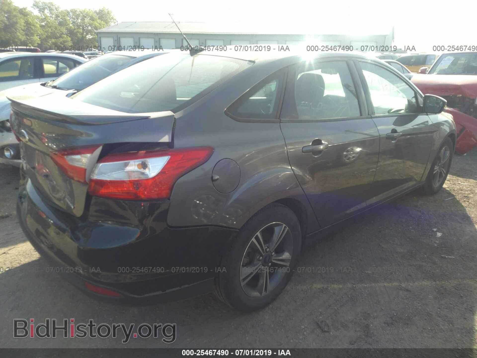 2014 FORD FOCUS - VIN: 1FADP3F20EL258909 - Photo 4