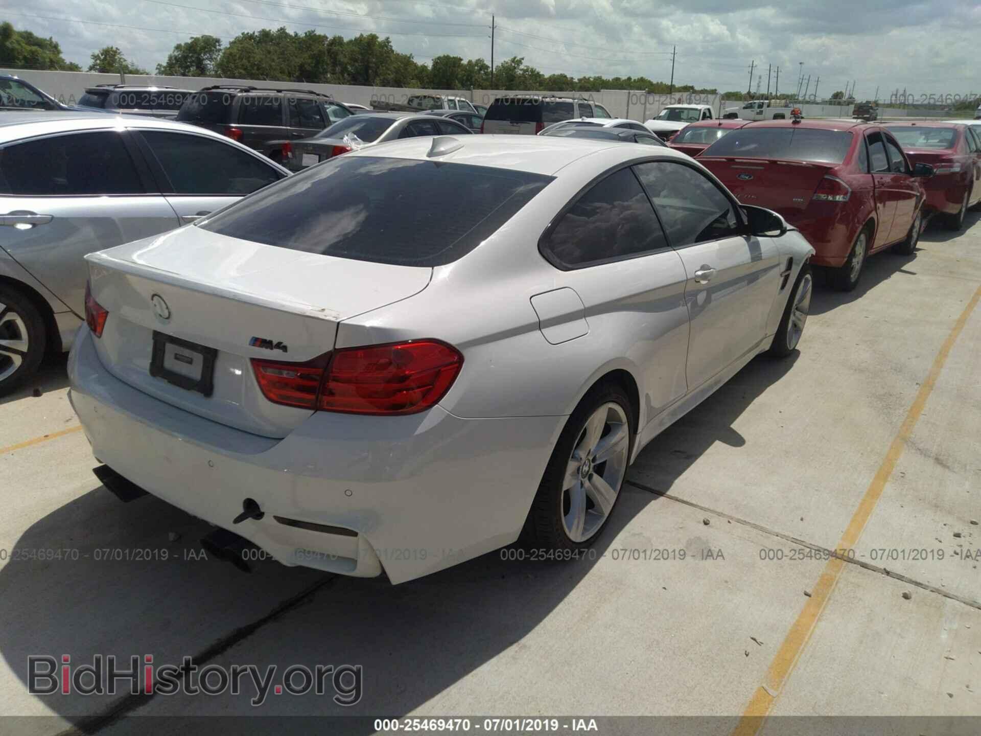 2015 BMW M4 - VIN: WBS3R9C58FK333051 - Фото 4
