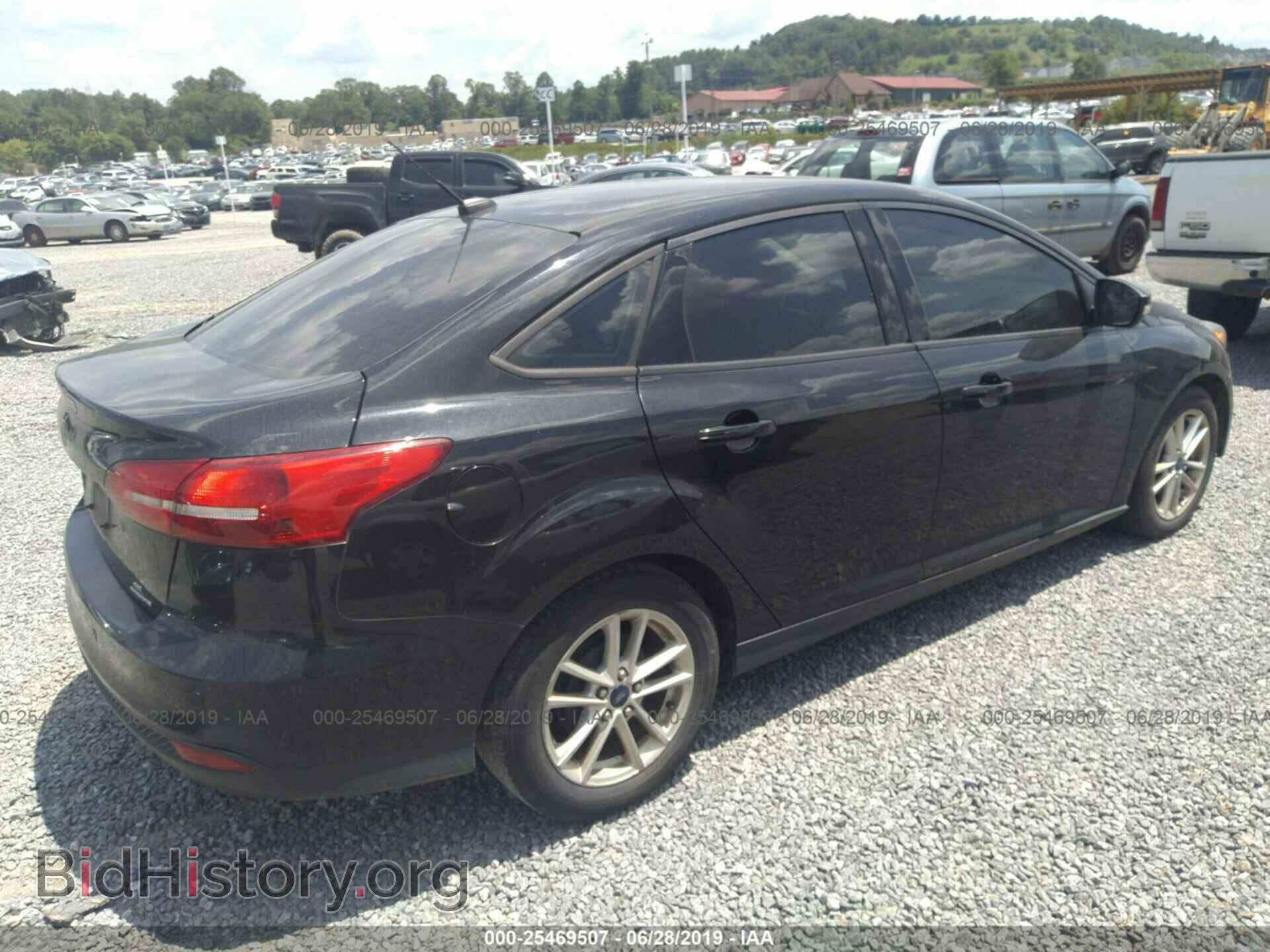 2015 FORD FOCUS - VIN: 1FADP3F20FL354010 - Photo 4