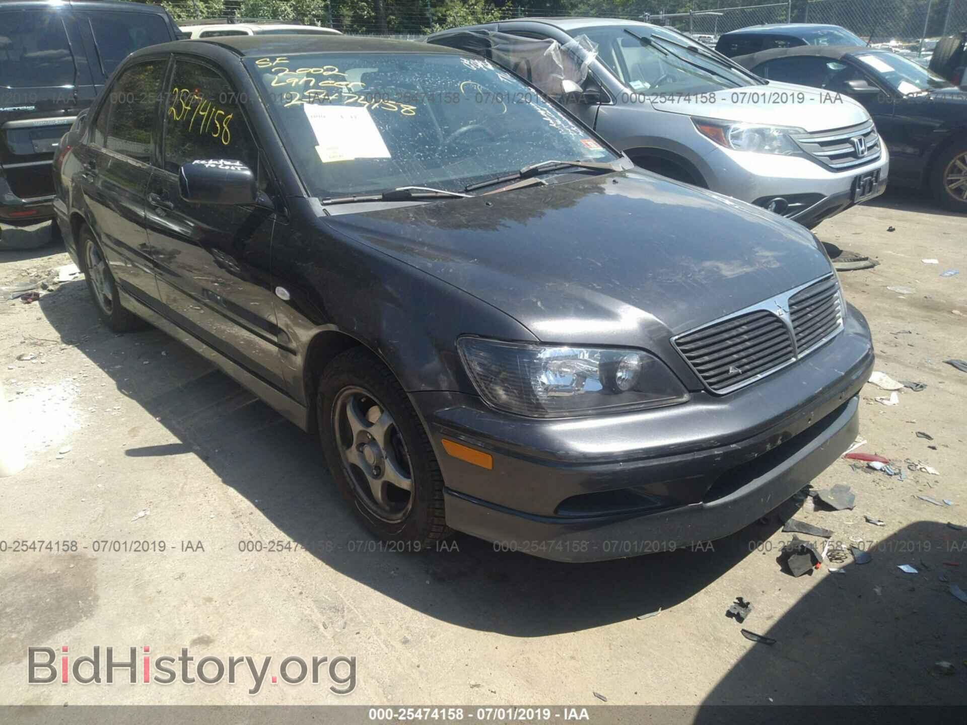 Photo JA3AJ86EX2U075740 - MITSUBISHI LANCER 2002
