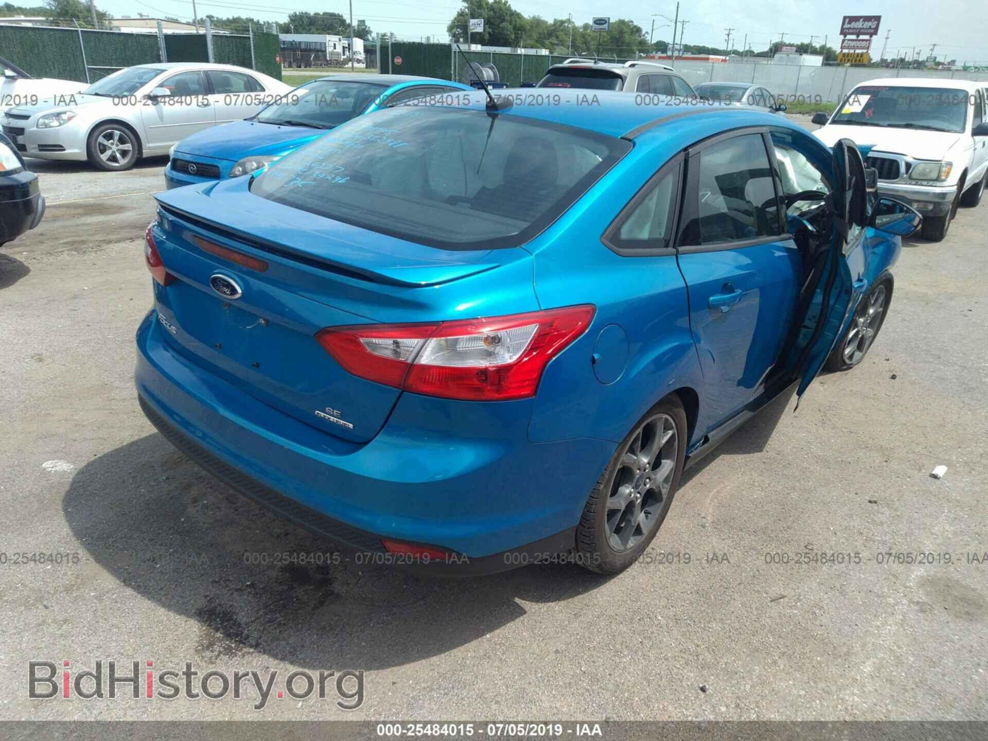 2014 FORD FOCUS - VIN: 1FADP3F25EL329277 - Photo 4