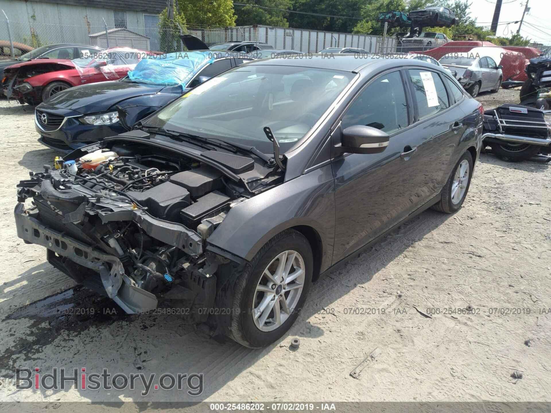 2016 FORD FOCUS - VIN: 1FADP3F23GL386080 - Фото 2