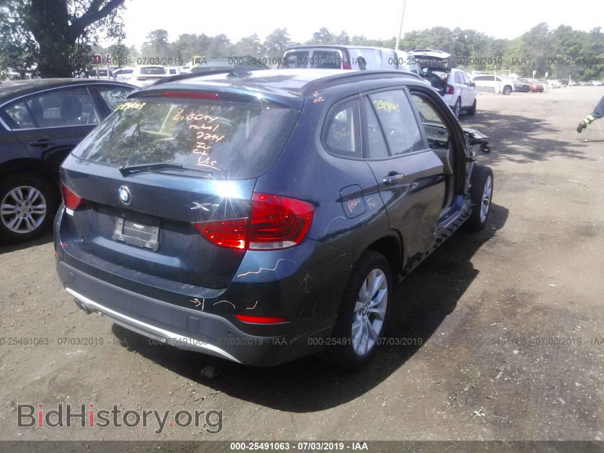 2014 BMW X1 - VIN: WBAVL1C55EVY20575 - Фото 4