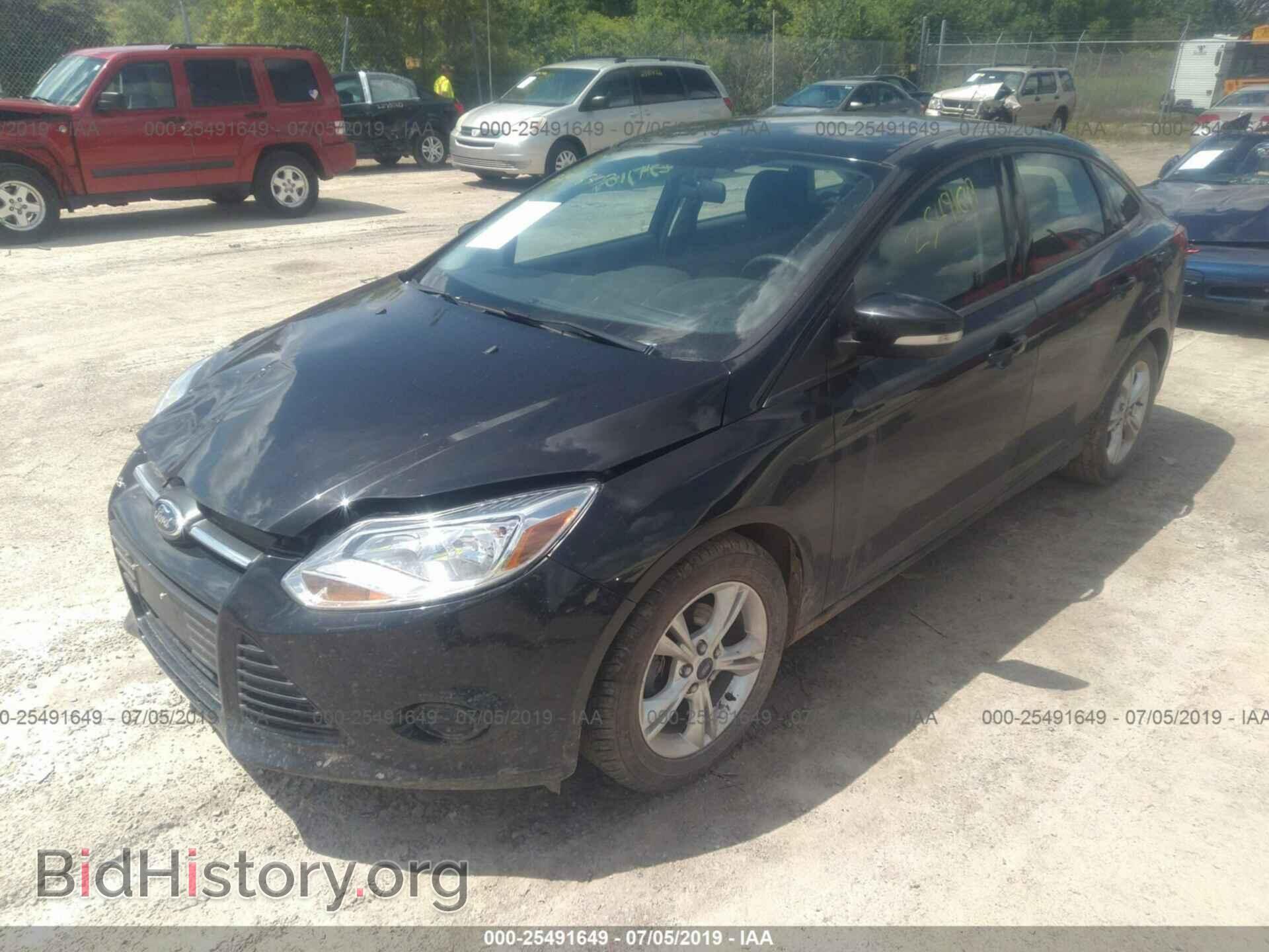 2014 FORD FOCUS - VIN: 1FADP3F24EL147991 - Photo 2