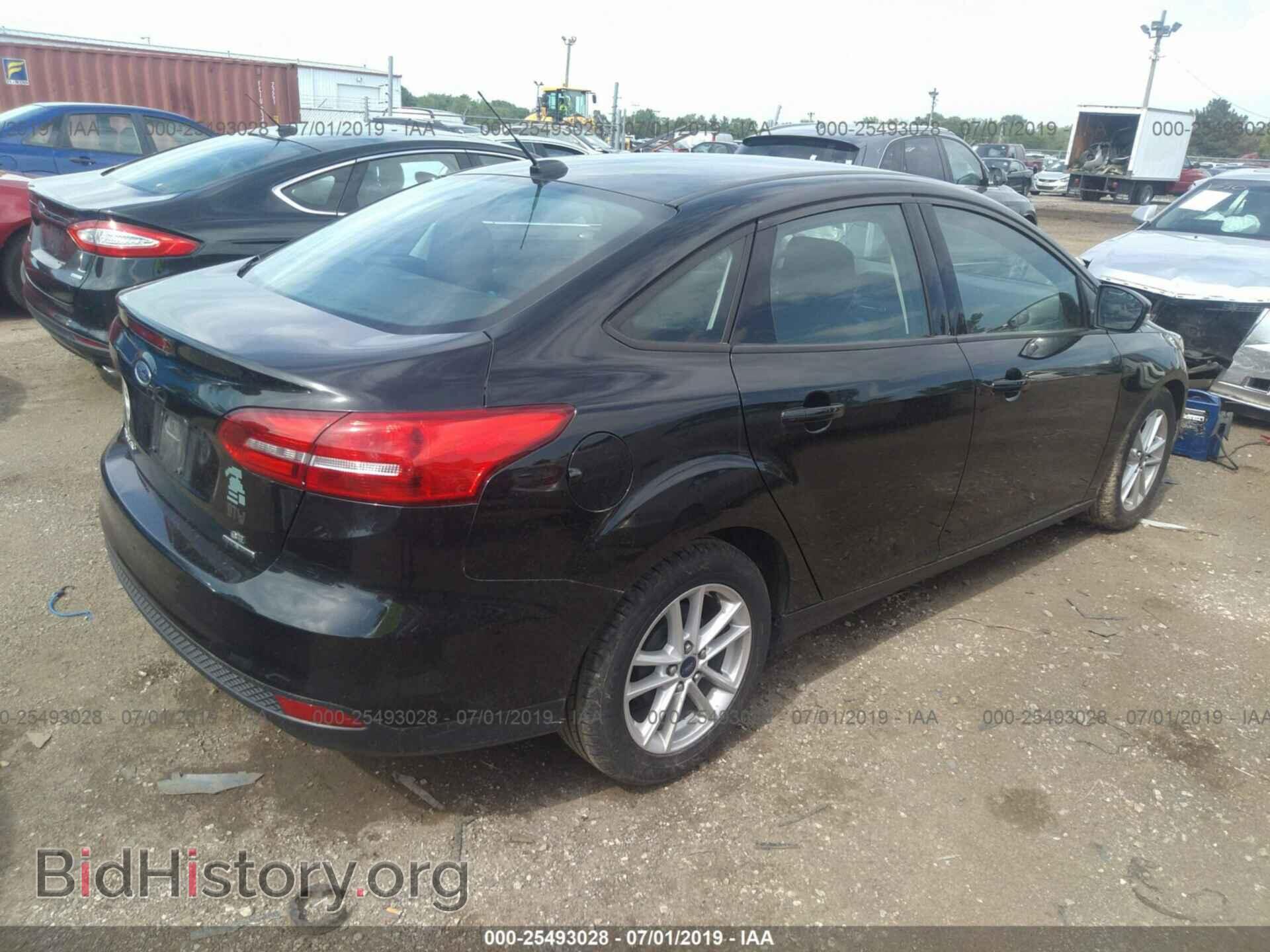 2015 FORD FOCUS - VIN: 1FADP3F25FL322590 - Photo 4