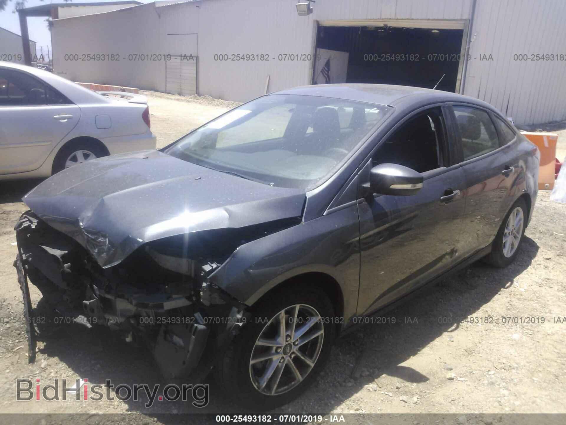 2015 FORD FOCUS - VIN: 1FADP3F20FL220579 - Photo 2