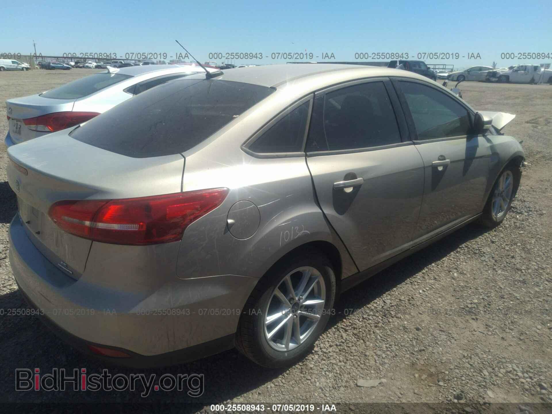 2016 FORD FOCUS - VIN: 1FADP3F21GL230488 - Photo 4