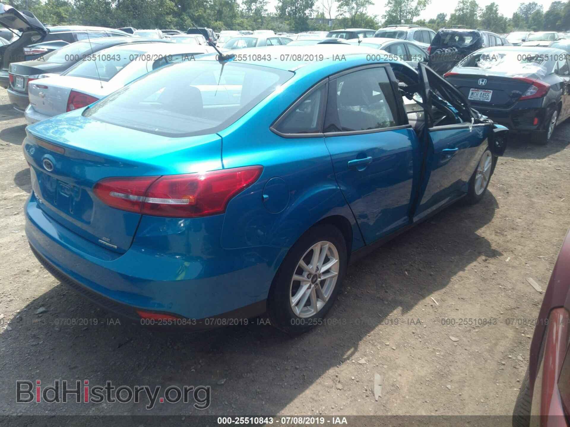2016 FORD FOCUS - VIN: 1FADP3F29GL318818 - Photo 4