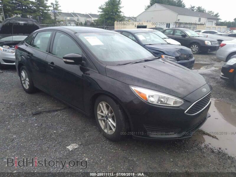 2016 Ford FOCUS SE (VIN 1FADP3F28GL236949) — фото 1 из 10, IAAI, повреждение: затопление
