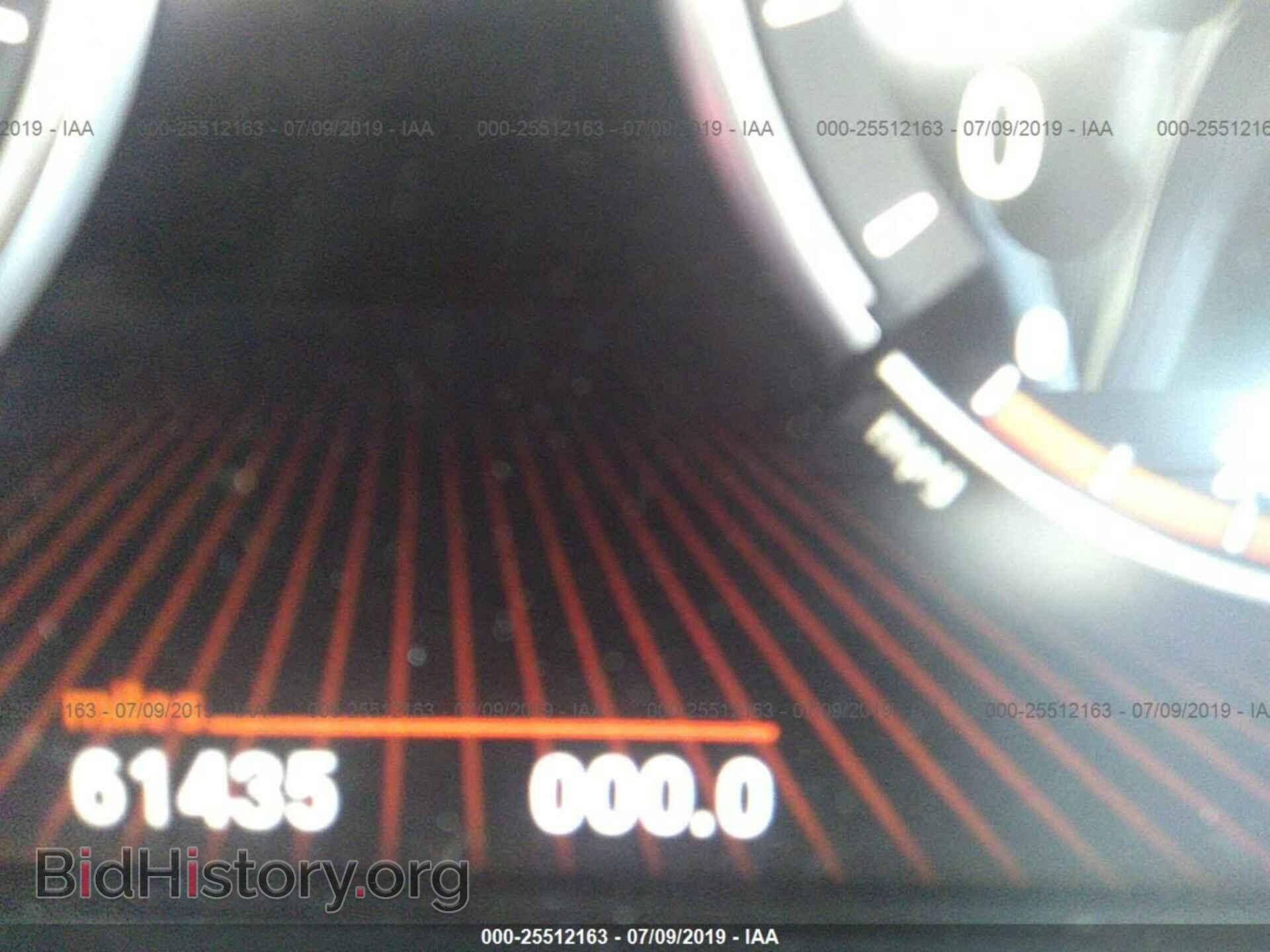 2012 BMW 750 - VIN: WBAKB8C58CC962460 - Фото 7
