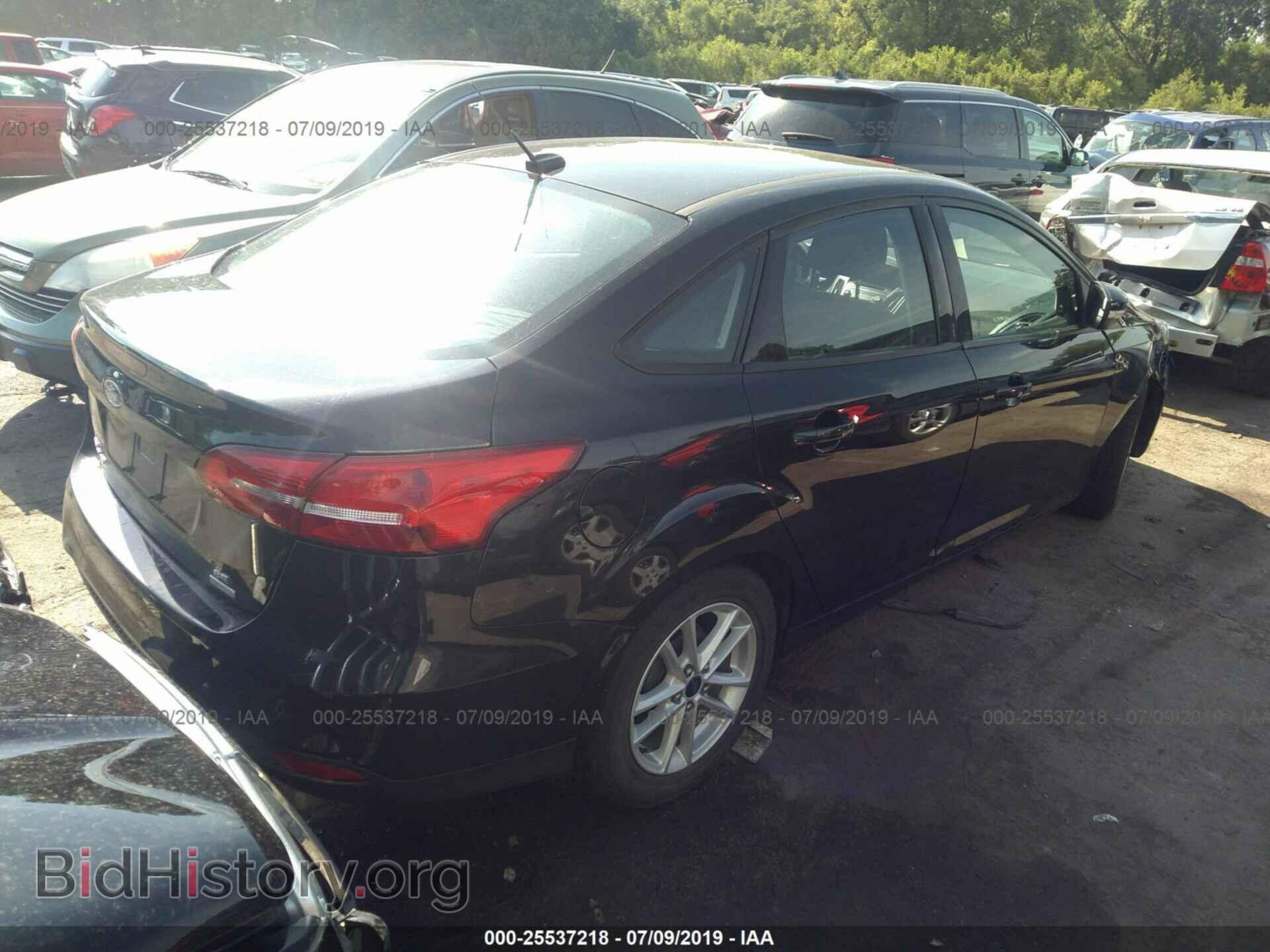 2015 FORD FOCUS - VIN: 1FADP3FE7FL219889 - Photo 4