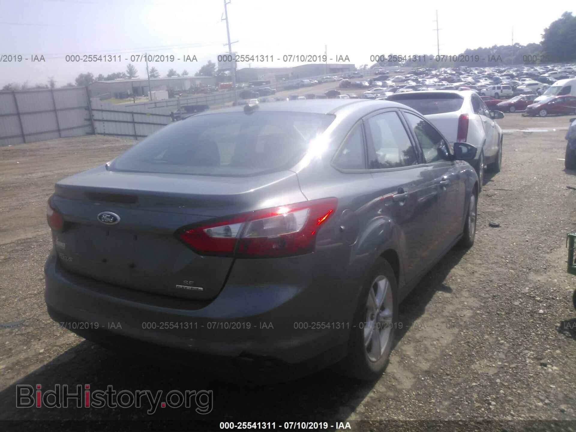 2014 FORD FOCUS - VIN: 1FADP3F29EL381382 - Photo 4