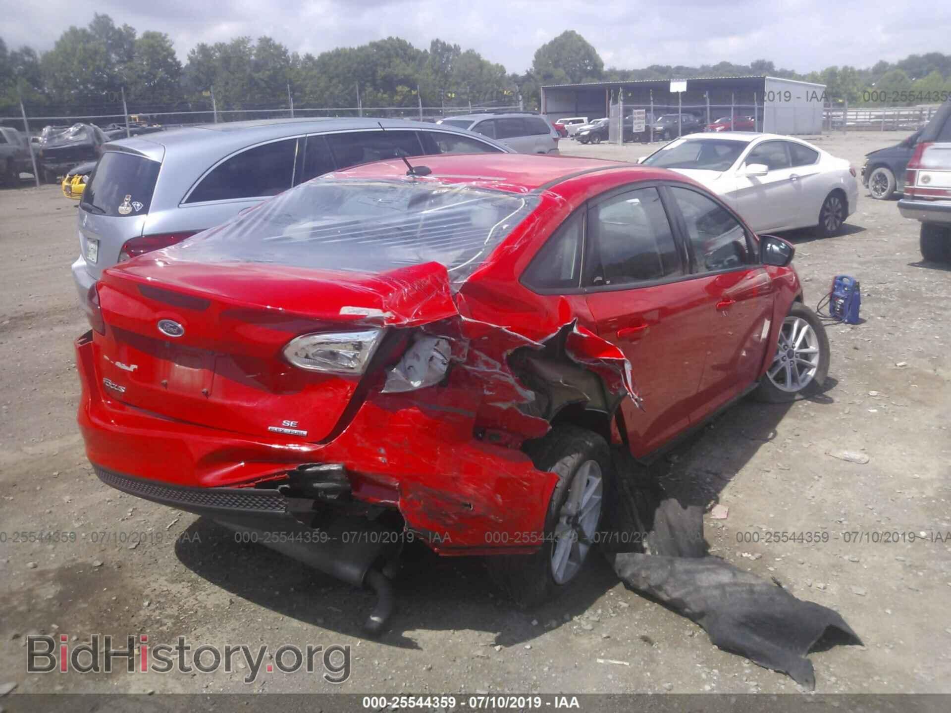 2015 FORD FOCUS - VIN: 1FADP3F27FL344932 - Photo 4
