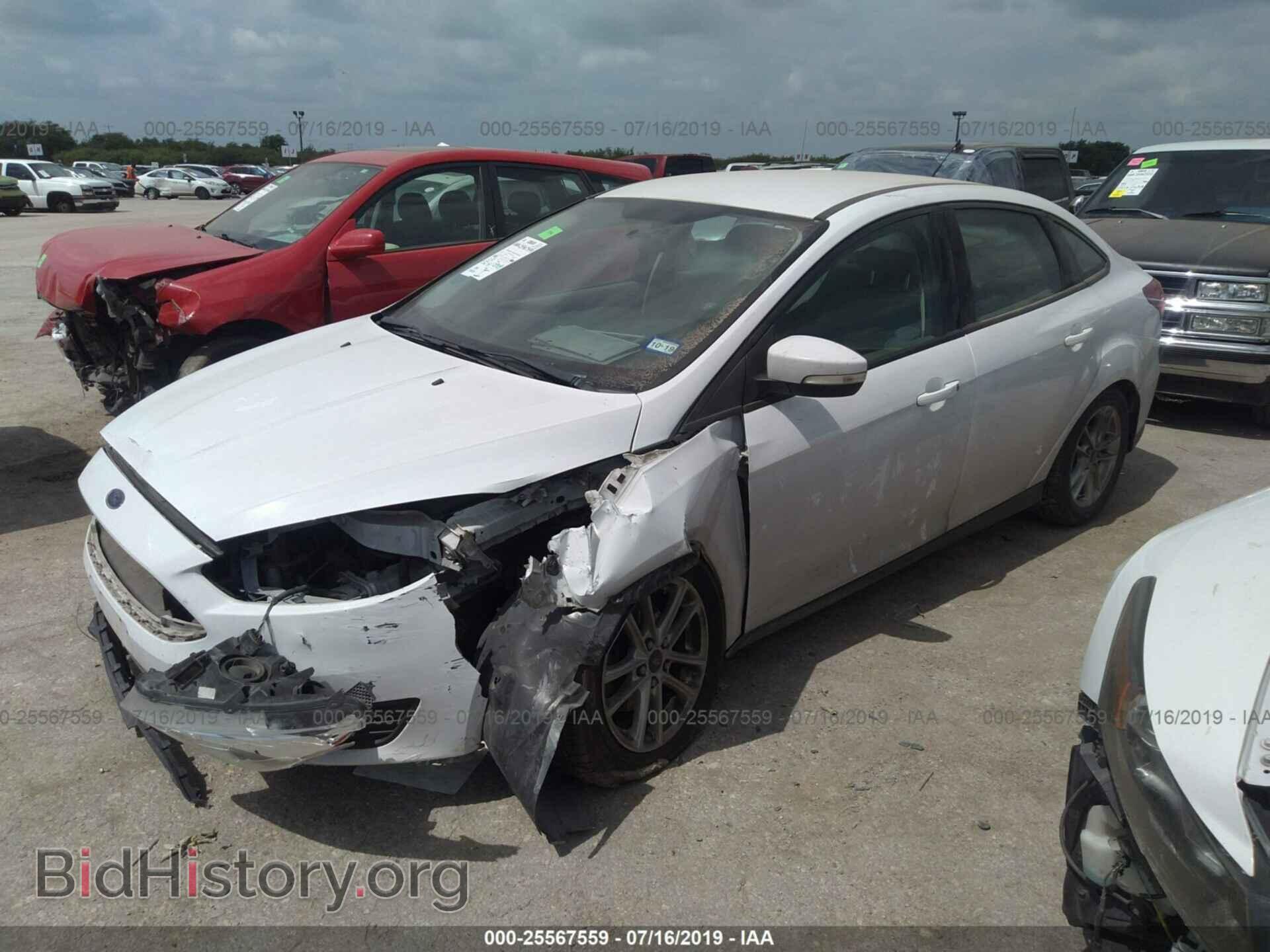 2016 FORD FOCUS - VIN: 1FADP3F21GL231589 - Фото 2