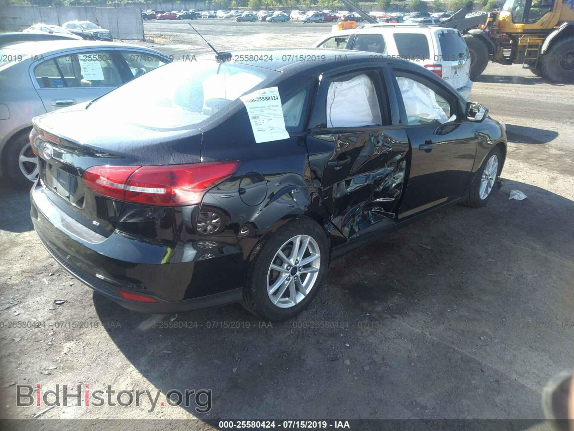 2016 FORD FOCUS - VIN: 1FADP3F23GL261077 - Photo 4