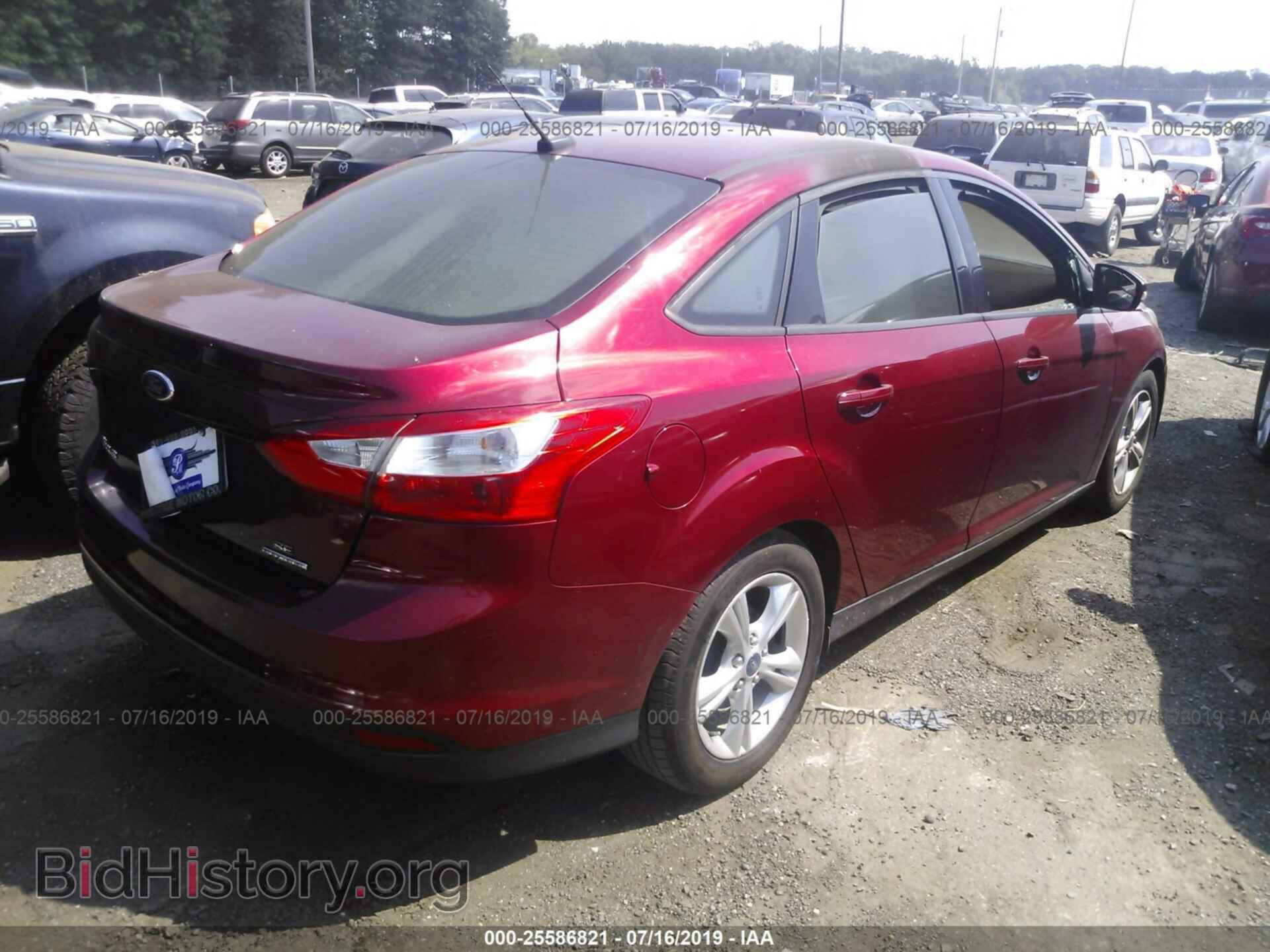 2014 FORD FOCUS - VIN: 1FADP3F29EL141880 - Photo 4