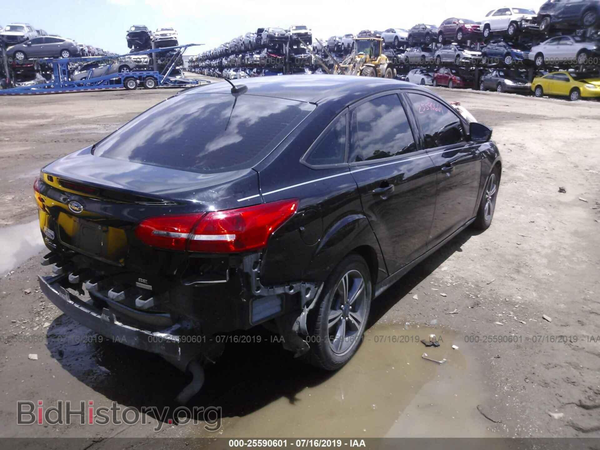 2016 FORD FOCUS - VIN: 1FADP3FE4GL201416 - Photo 4