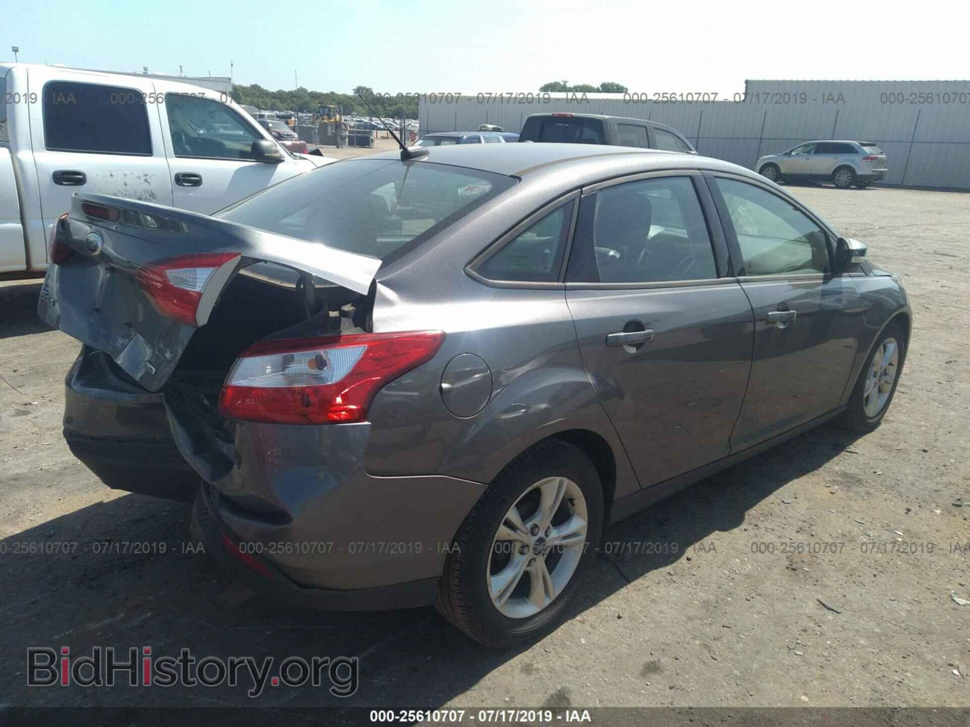 2014 FORD FOCUS - VIN: 1FADP3F21EL406338 - Photo 4