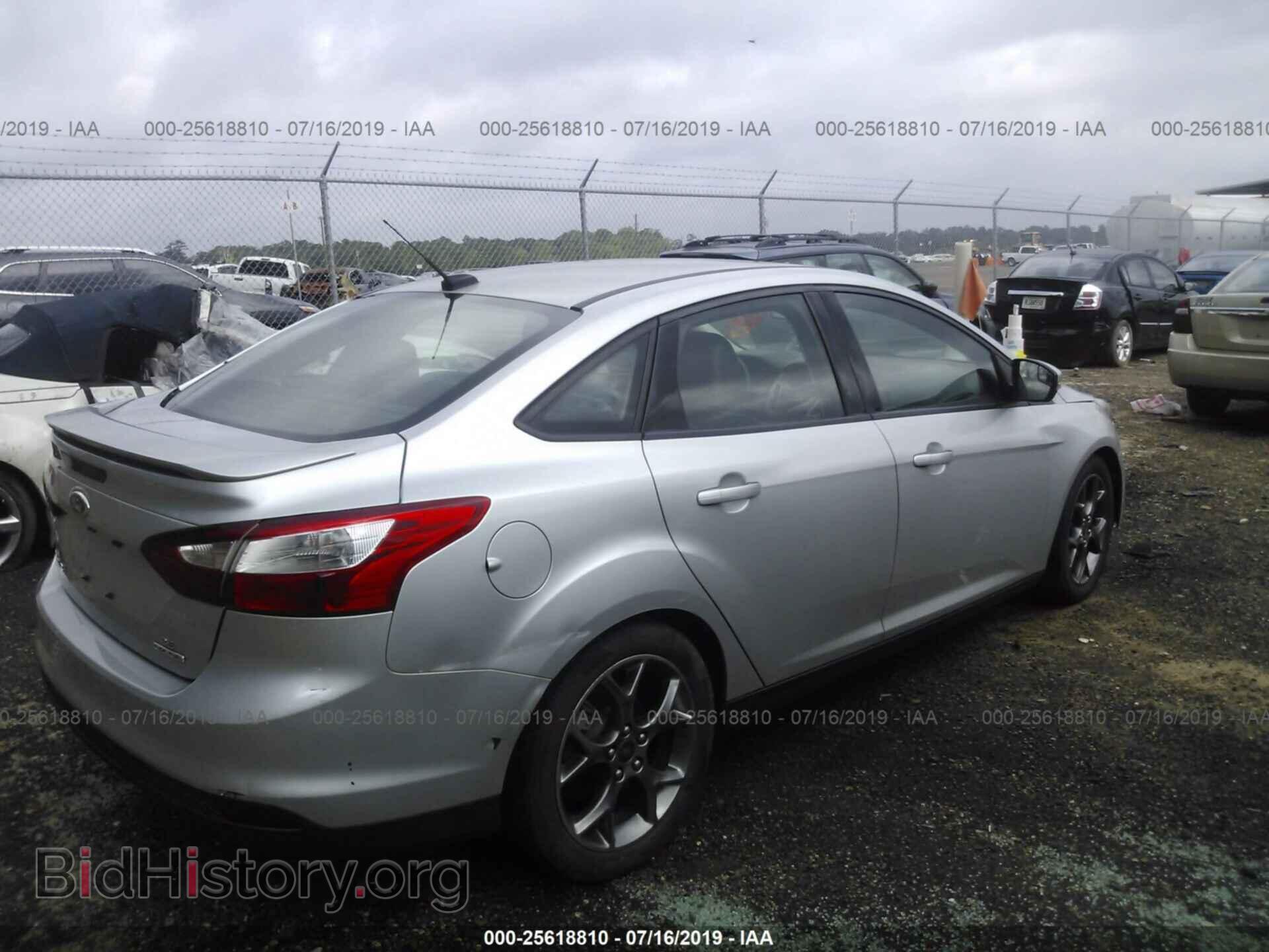 2014 FORD FOCUS - VIN: 1FADP3F2XEL102697 - Photo 4
