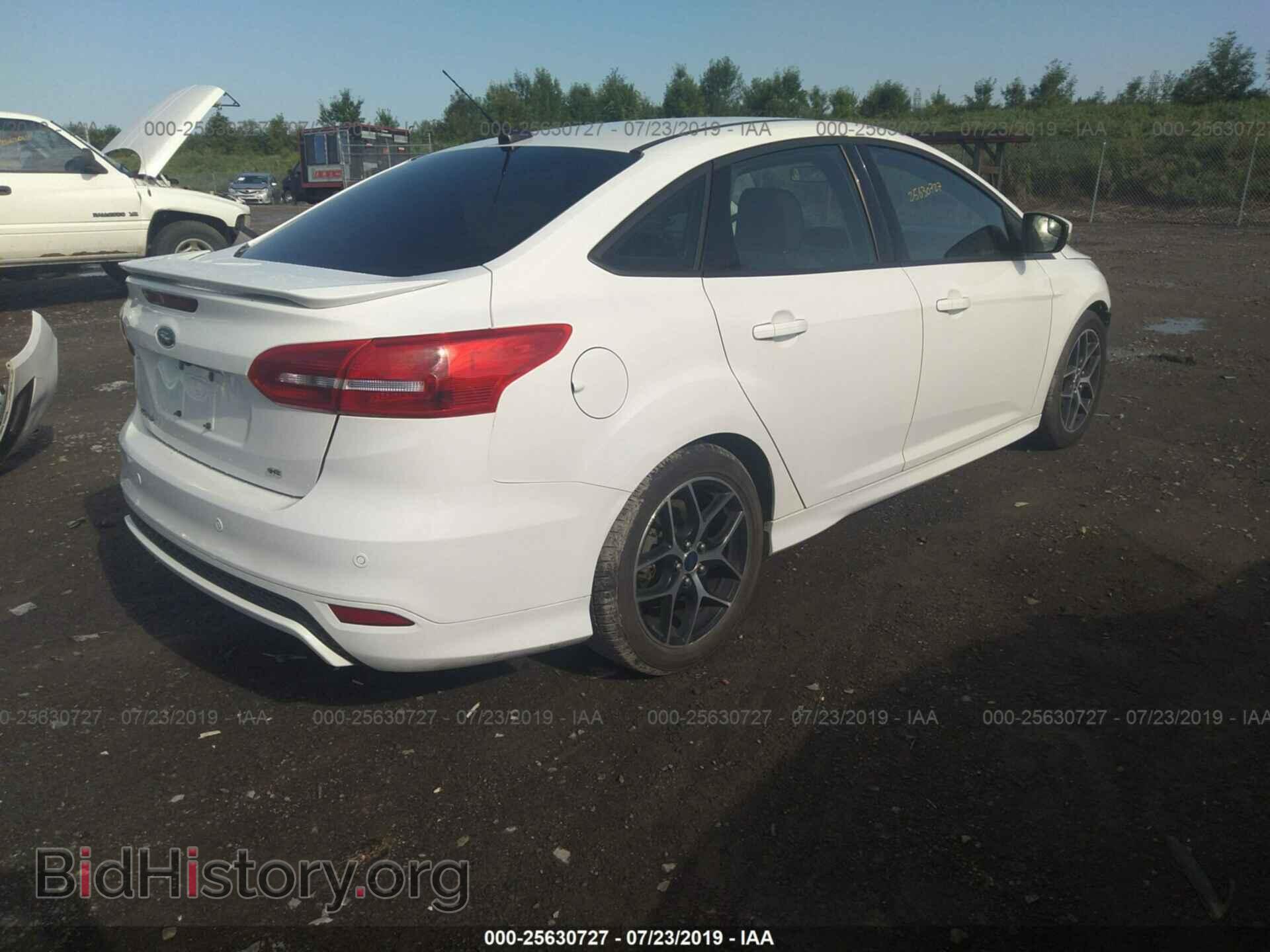 2015 FORD FOCUS - VIN: 1FADP3F20FL332878 - Photo 4