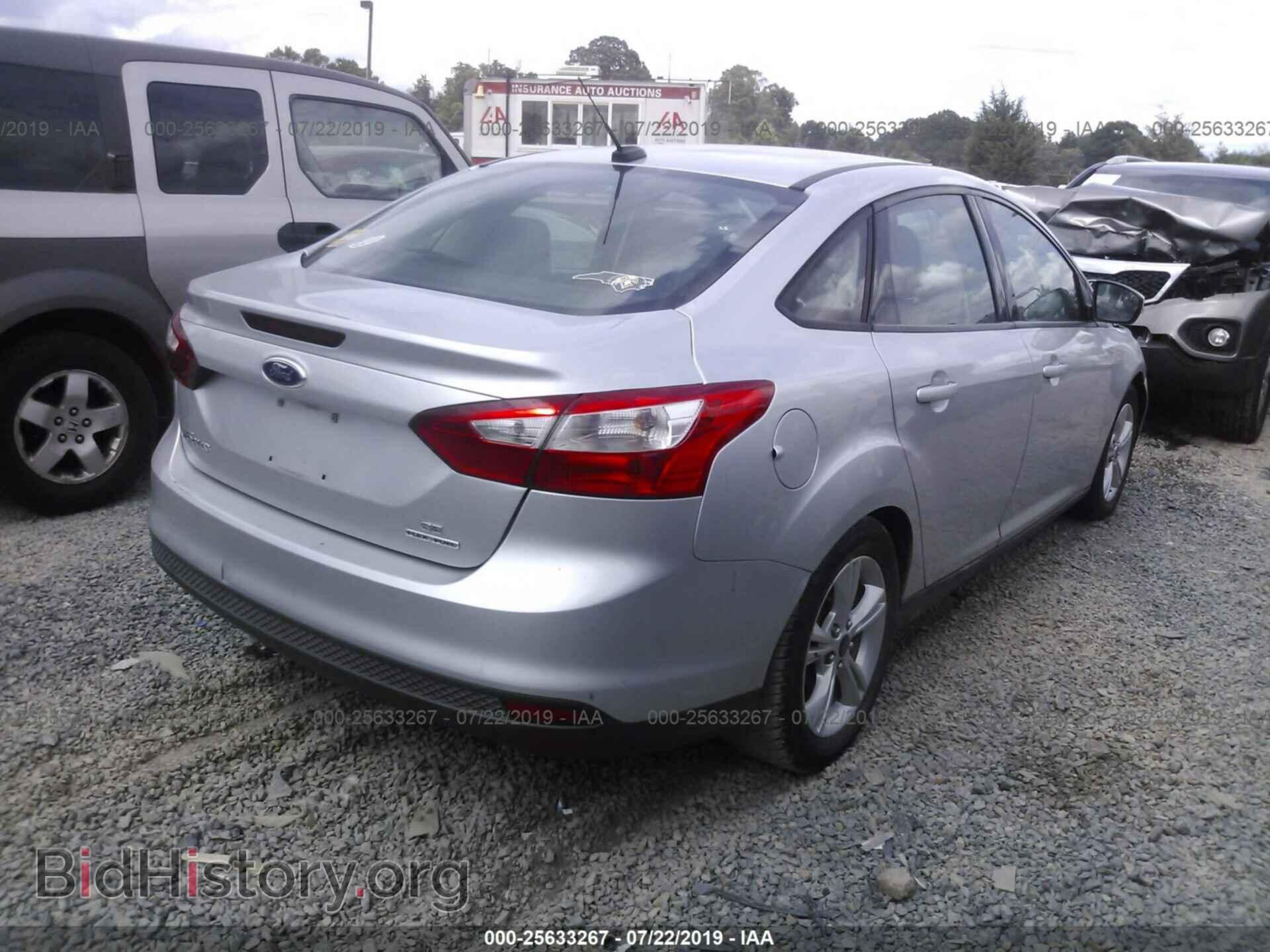 2014 FORD FOCUS - VIN: 1FADP3F20EL126488 - Photo 4