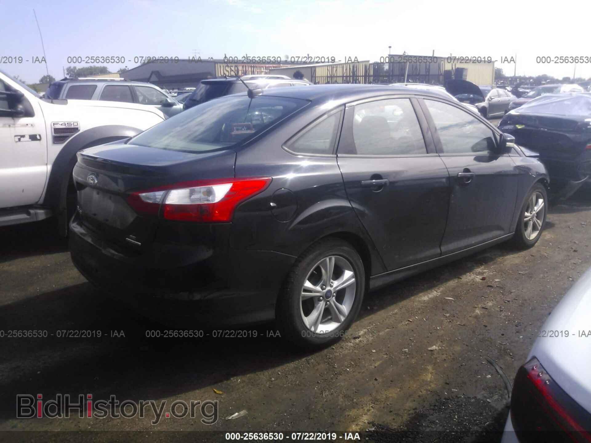 2014 FORD FOCUS - VIN: 1FADP3F25EL107516 - Photo 4