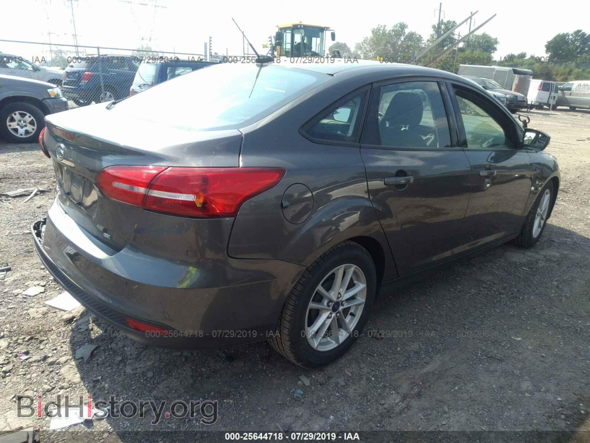2015 FORD FOCUS - VIN: 1FADP3F21FL372161 - Photo 4