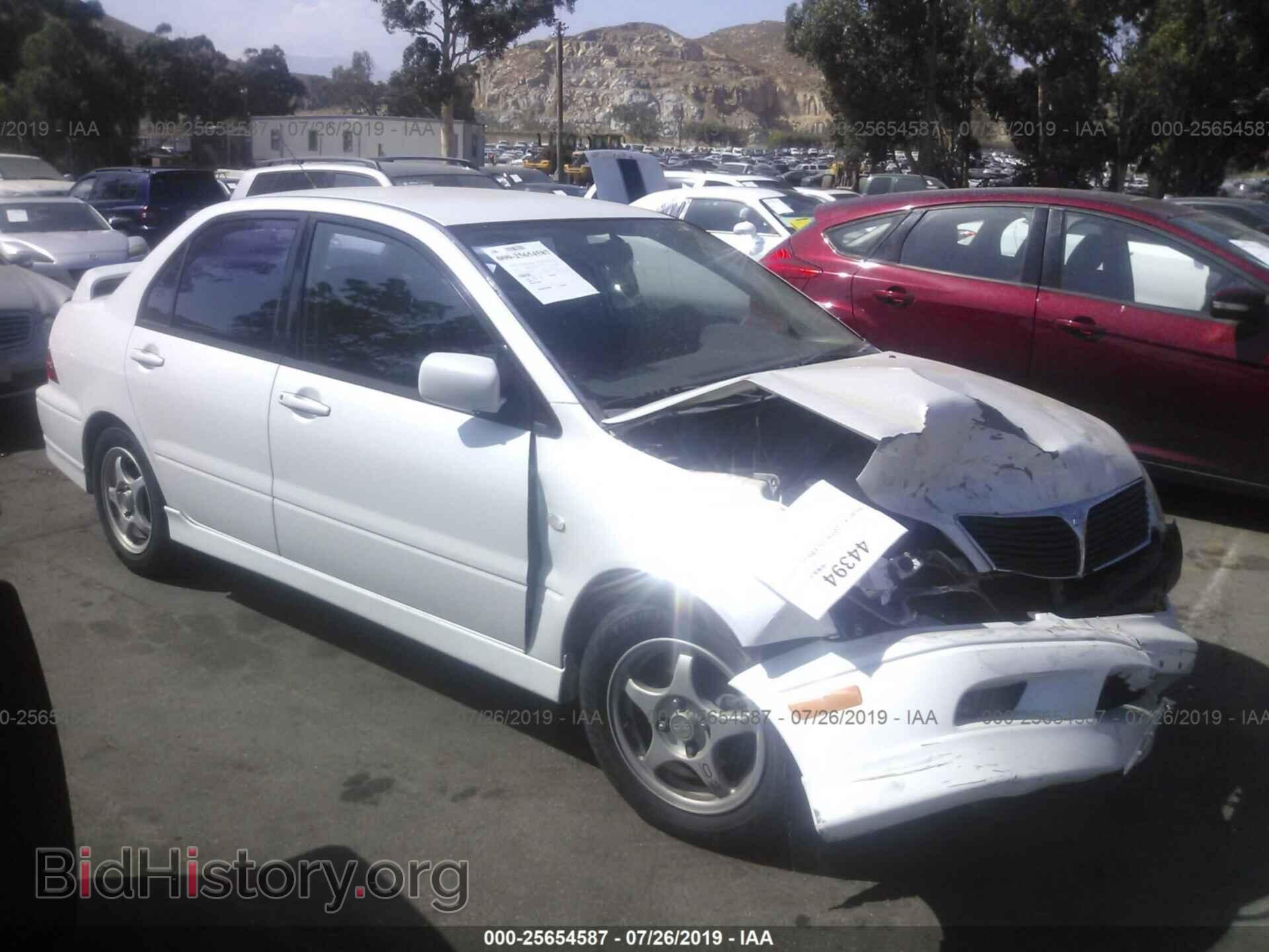 Photo JA3AJ86EX2U083322 - MITSUBISHI LANCER 2002