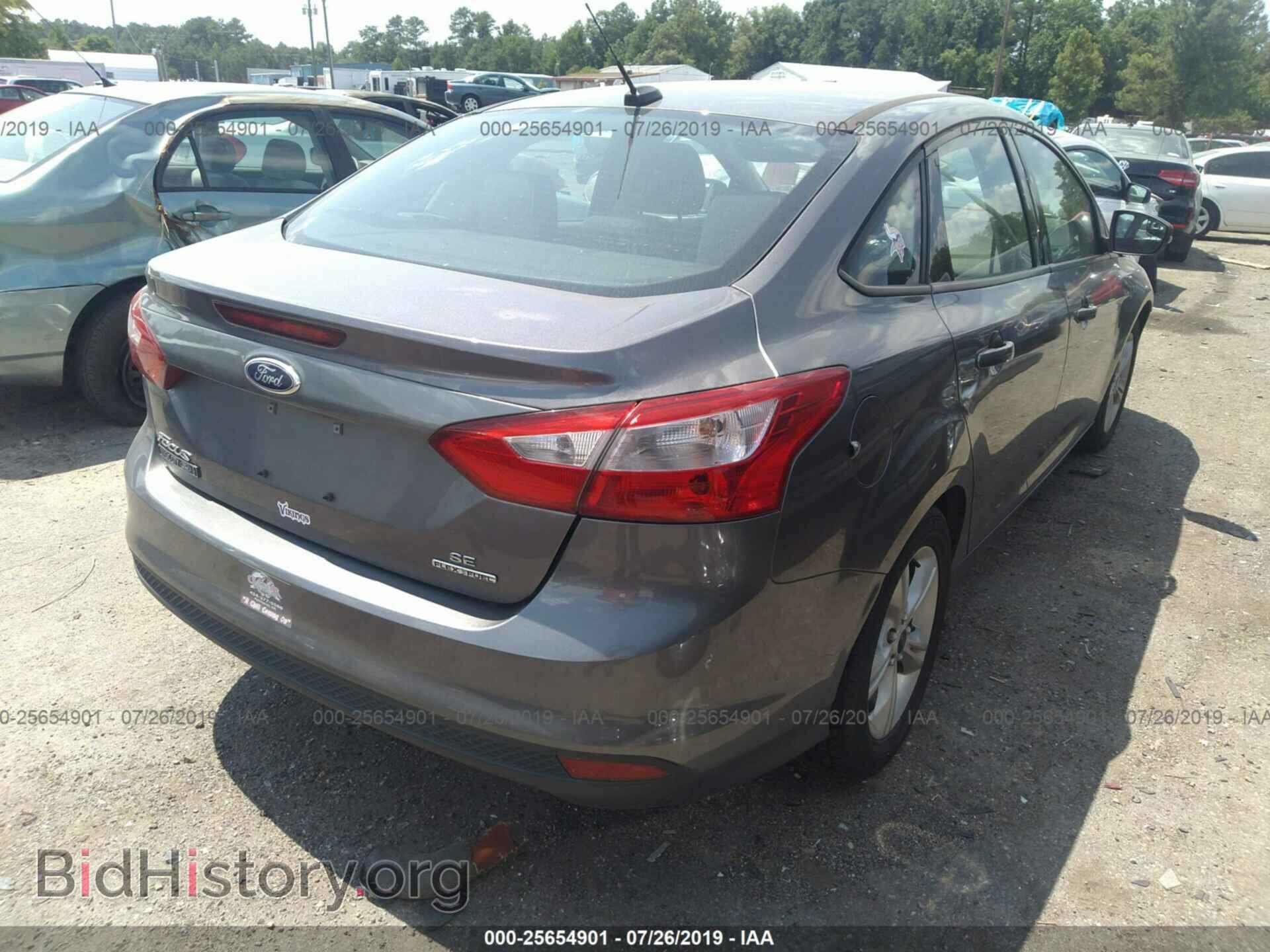 2014 FORD FOCUS - VIN: 1FADP3F22EL450722 - Photo 4