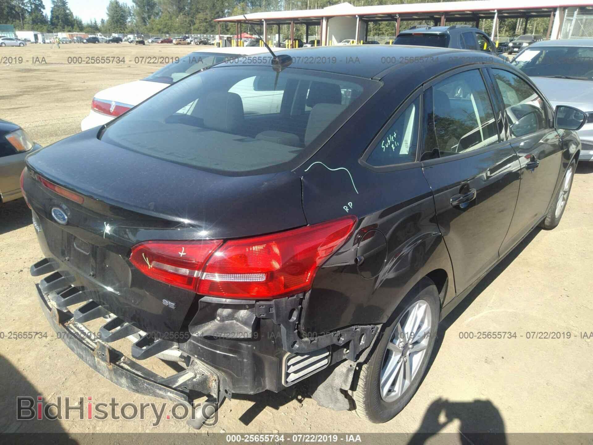 2015 FORD FOCUS - VIN: 1FADP3F22FL358687 - Photo 4
