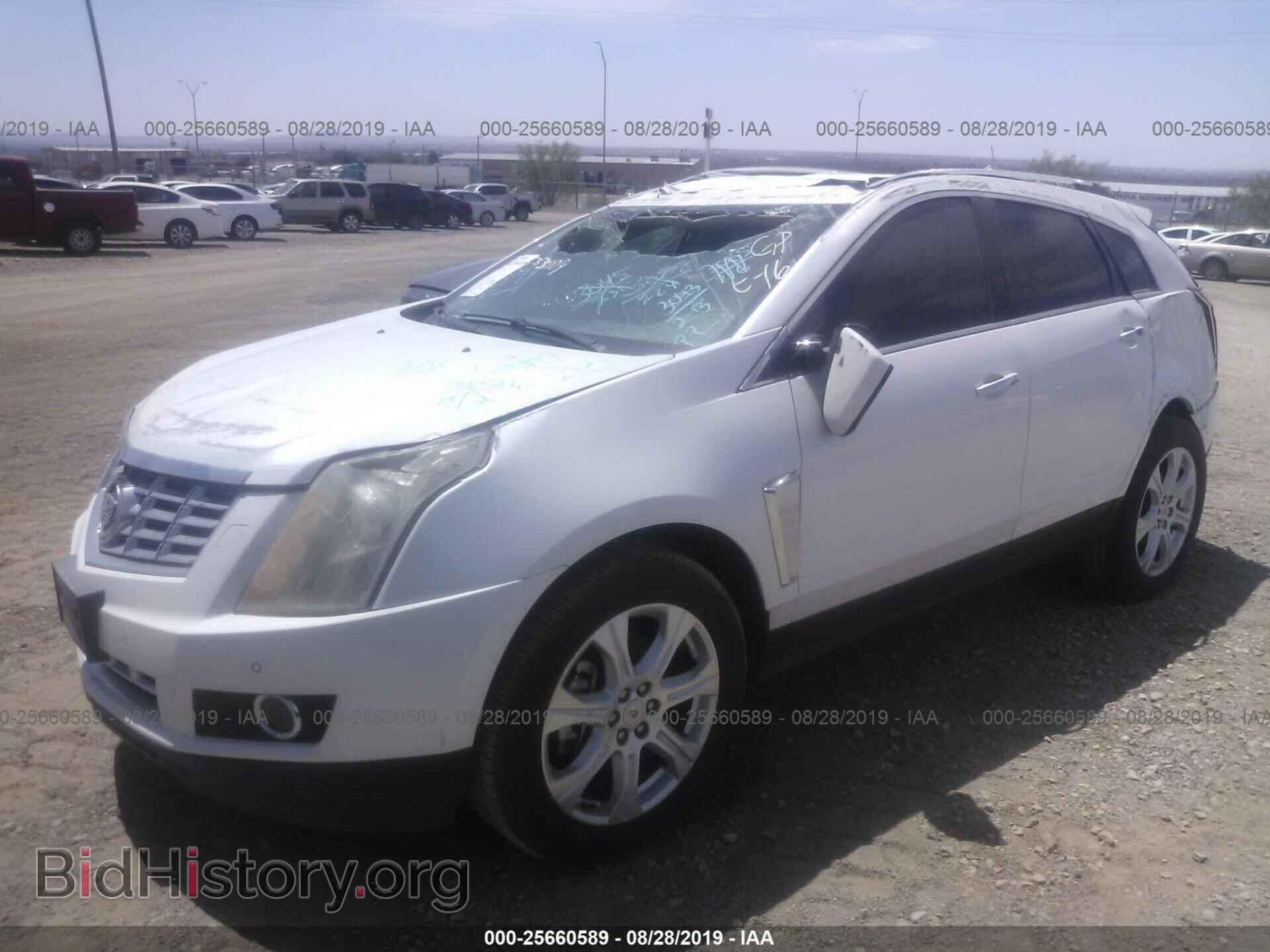 2013 CADILLAC SRX - VIN: 3GYFNDE31DS522019 - Фото 2