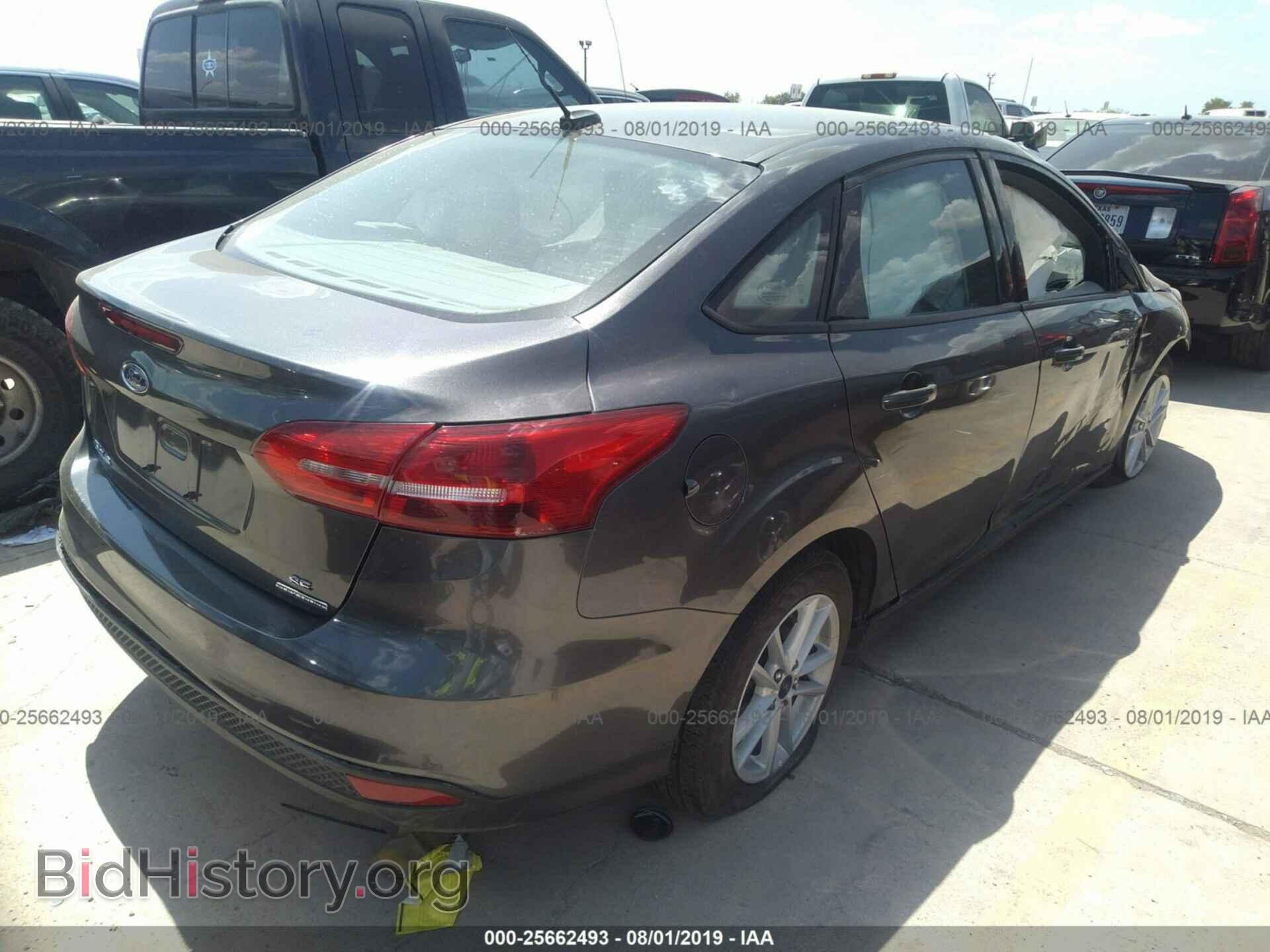 2016 FORD FOCUS - VIN: 1FADP3F21GL383310 - Photo 4