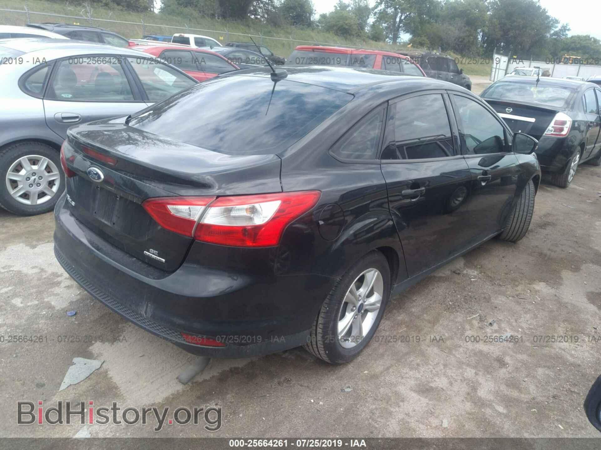 2014 FORD FOCUS - VIN: 1FADP3F29EL381379 - Photo 4