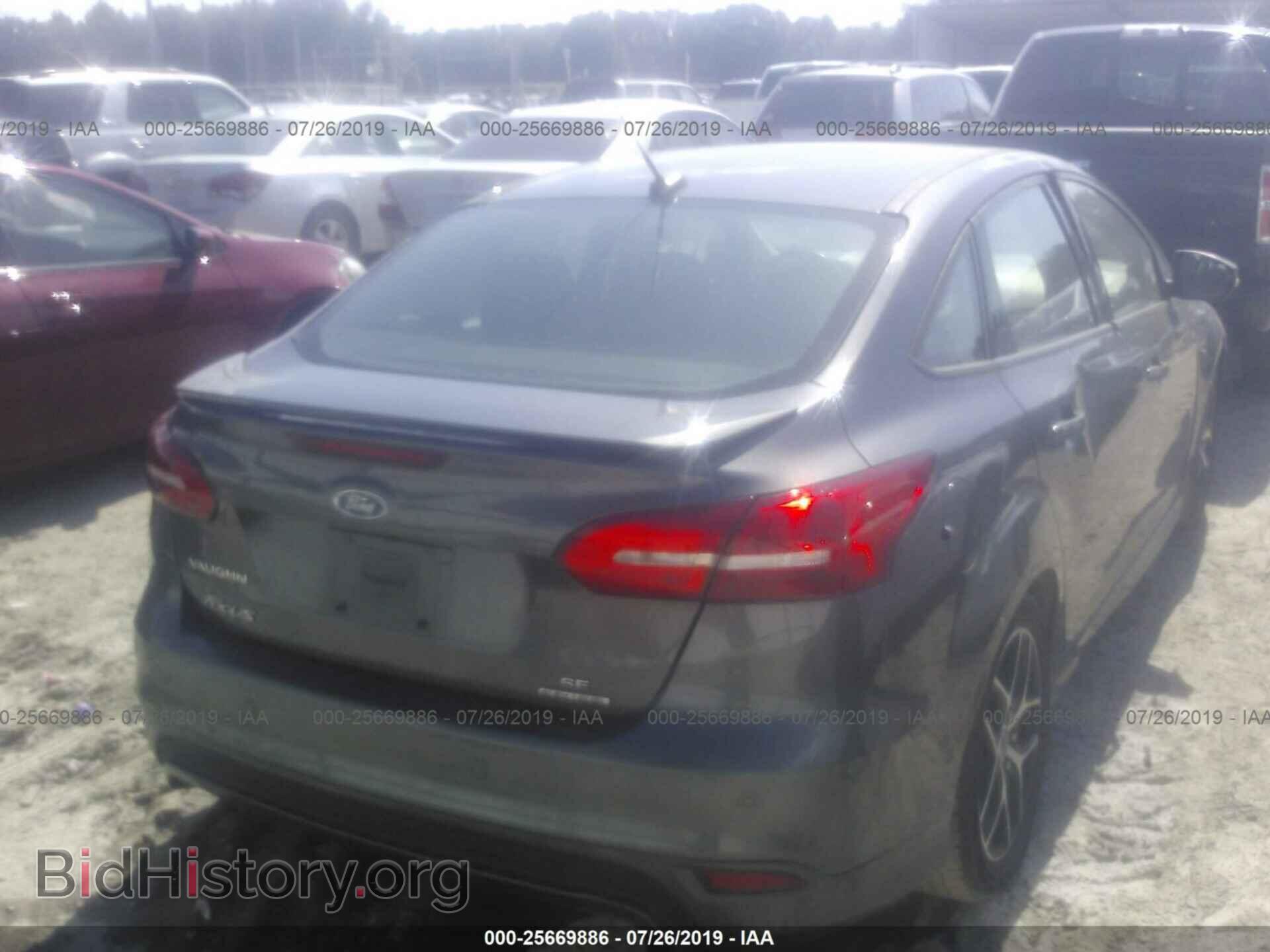 2015 FORD FOCUS - VIN: 1FADP3F25FL321844 - Photo 4