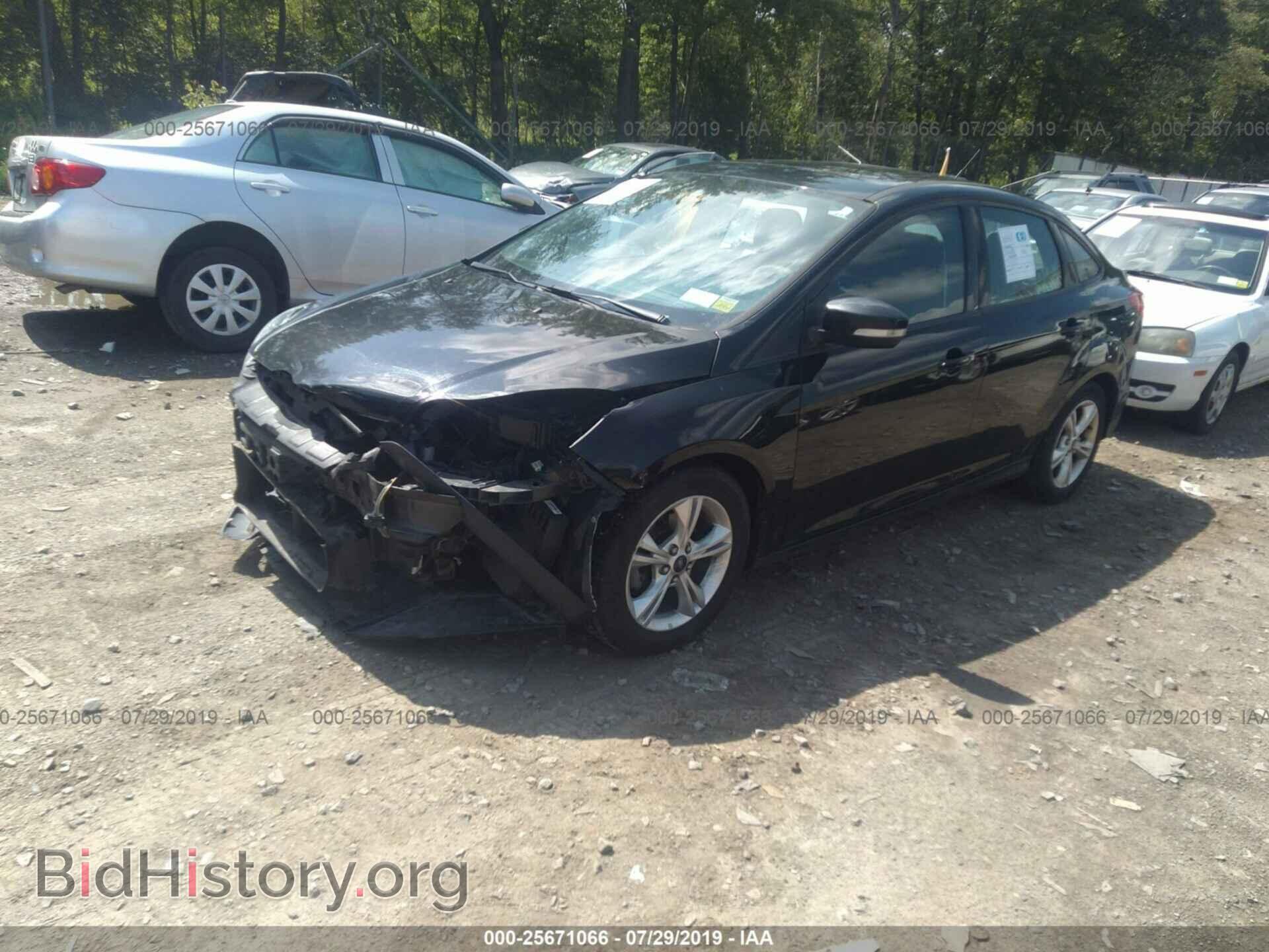 2014 FORD FOCUS - VIN: 1FADP3F2XEL323040 - Photo 2