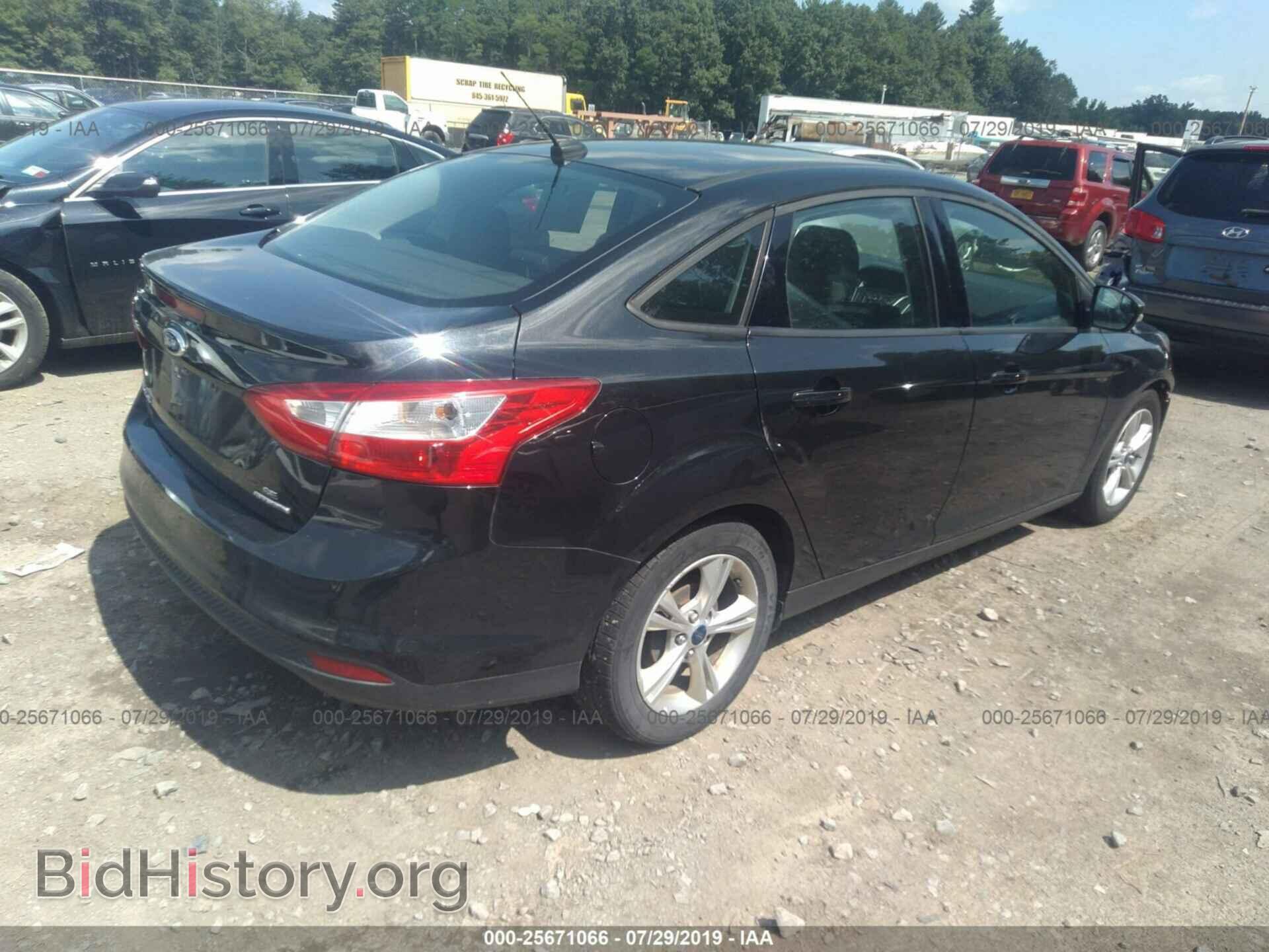 2014 FORD FOCUS - VIN: 1FADP3F2XEL323040 - Photo 4