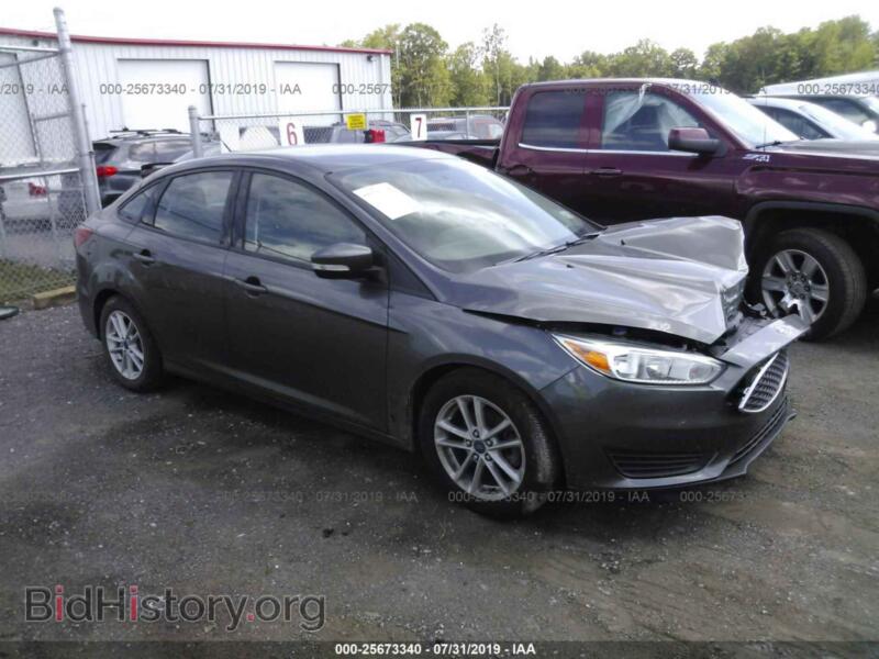2016 Ford FOCUS SE (VIN 1FADP3F26GL266919) — photo 1 of 10, IAAI, damage: left front
